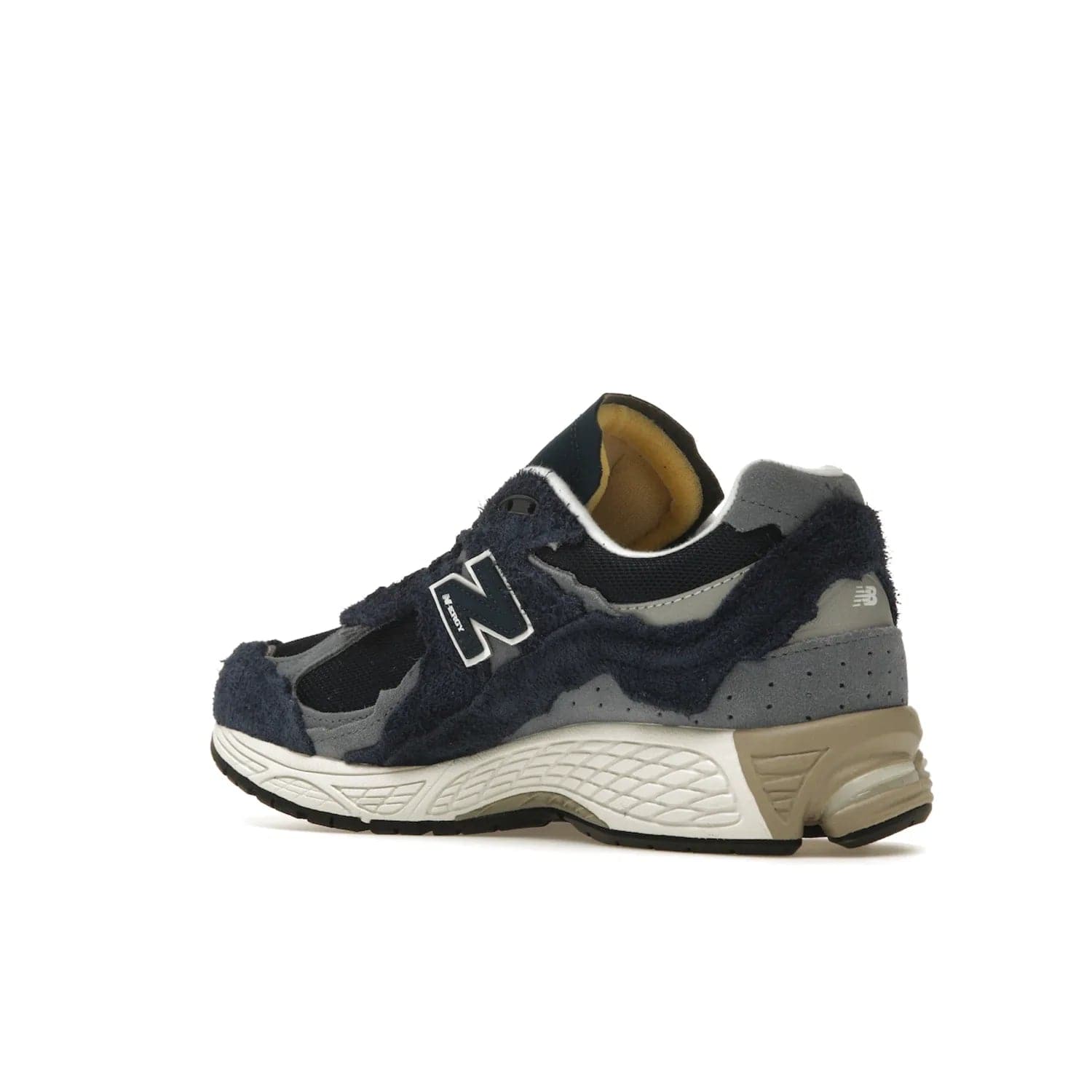 New Balance 2002R Protection Pack Navy Grey - Image 23 - Only at www.BallersClubKickz.com - Get the New Balance 2002R Protection Pack Navy Grey for a statement look. Crafted by Yue Wu, this sneaker features a mesh base, navy suede overlays, and a white and earth midsole. Released Feb 14, 2023.