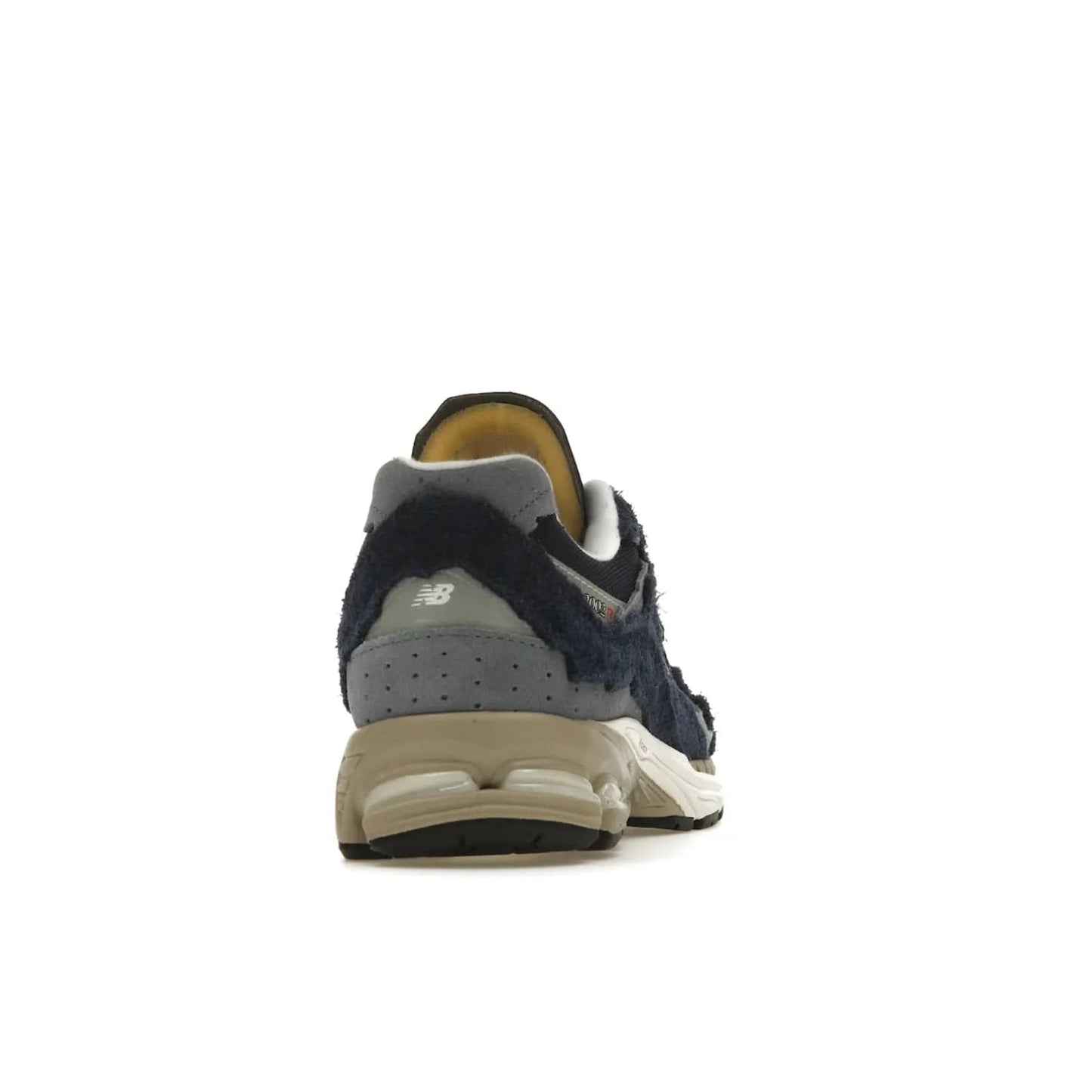 New Balance 2002R Protection Pack Navy Grey - Image 29 - Only at www.BallersClubKickz.com - Get the New Balance 2002R Protection Pack Navy Grey for a statement look. Crafted by Yue Wu, this sneaker features a mesh base, navy suede overlays, and a white and earth midsole. Released Feb 14, 2023.