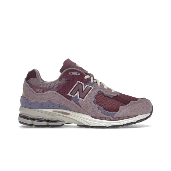 New Balance 2002R Protection Pack Pink - Image 1 - Only at www.BallersClubKickz.com - Introducing the New Balance 2002R Protection Pack Pink -- a vivid fusion of colors and design elements with distressed look and energy tech. Get your hands on this masterpiece in September 2022.