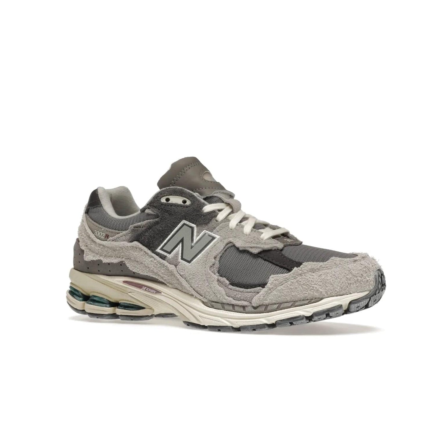 New Balance 2002R Protection Pack Rain Cloud - Image 4 - Only at www.BallersClubKickz.com - The New Balance 2002R Protection Pack Rain Cloud combines style and comfort. Featuring a grey mesh upper, jagged suede overlays and a reflective logo, a vibrant rain cloud motif on the heel stands out! Not just good-looking, the Nrgy midsole and soft grey outsole provide cushioning and comfort. Make a statement with the iconic New Balance 2002R Protection Pack Rain Cloud.