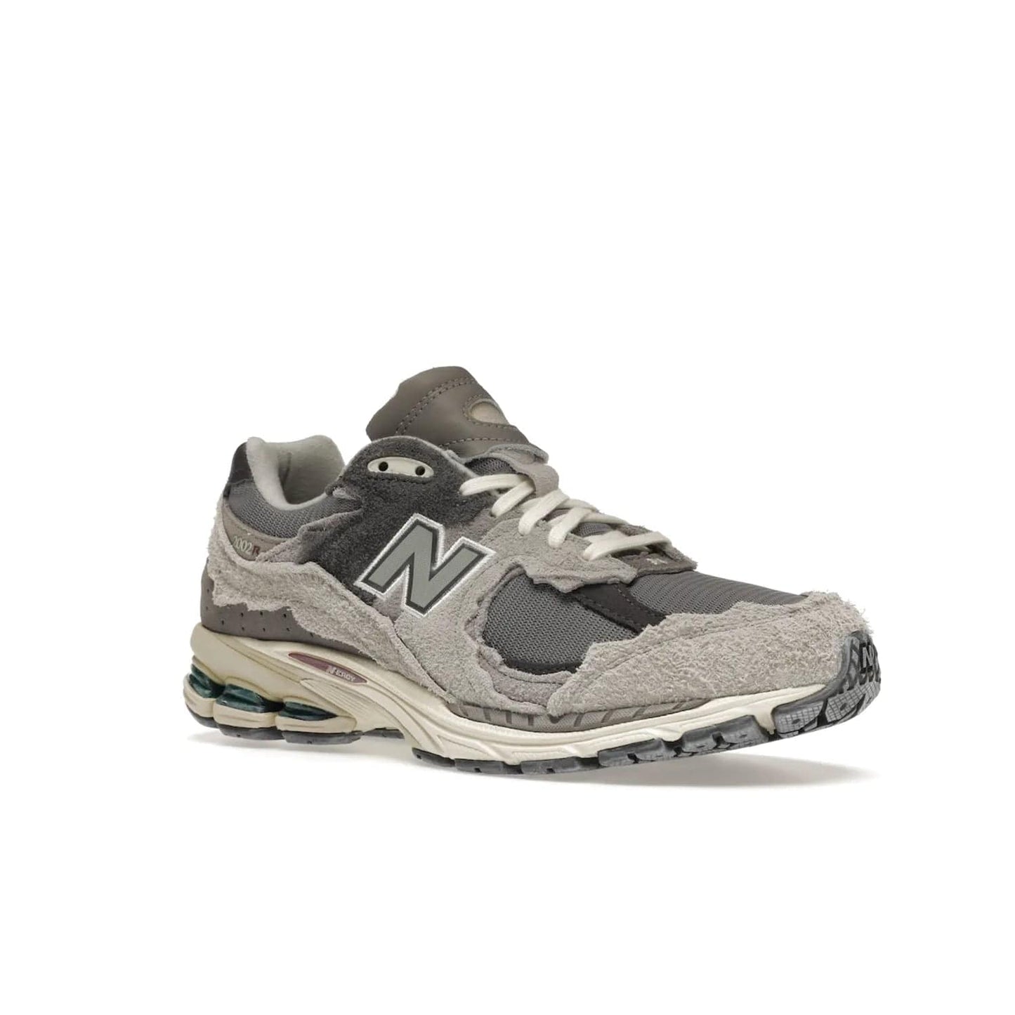 New Balance 2002R Protection Pack Rain Cloud - Image 5 - Only at www.BallersClubKickz.com - The New Balance 2002R Protection Pack Rain Cloud combines style and comfort. Featuring a grey mesh upper, jagged suede overlays and a reflective logo, a vibrant rain cloud motif on the heel stands out! Not just good-looking, the Nrgy midsole and soft grey outsole provide cushioning and comfort. Make a statement with the iconic New Balance 2002R Protection Pack Rain Cloud.