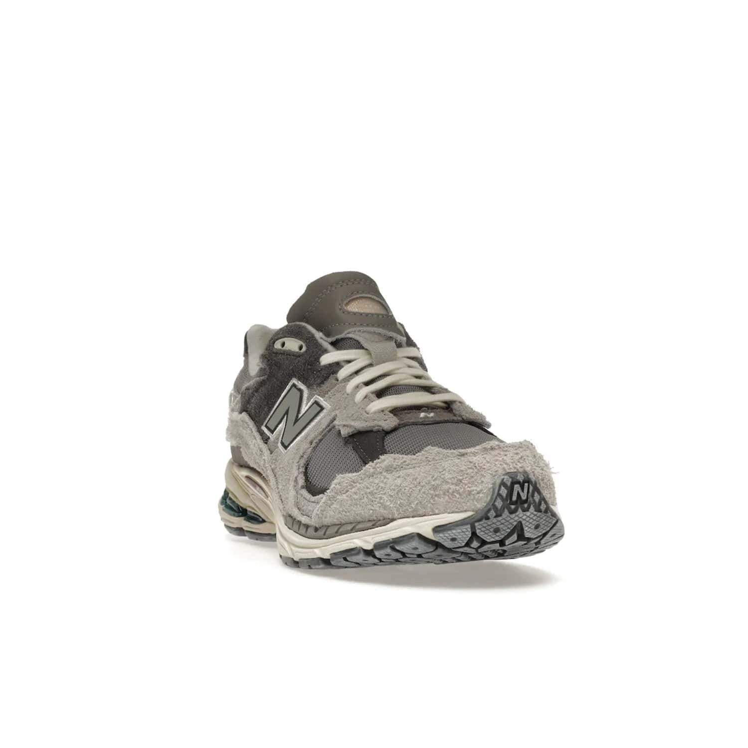 New Balance 2002R Protection Pack Rain Cloud - Image 8 - Only at www.BallersClubKickz.com - The New Balance 2002R Protection Pack Rain Cloud combines style and comfort. Featuring a grey mesh upper, jagged suede overlays and a reflective logo, a vibrant rain cloud motif on the heel stands out! Not just good-looking, the Nrgy midsole and soft grey outsole provide cushioning and comfort. Make a statement with the iconic New Balance 2002R Protection Pack Rain Cloud.