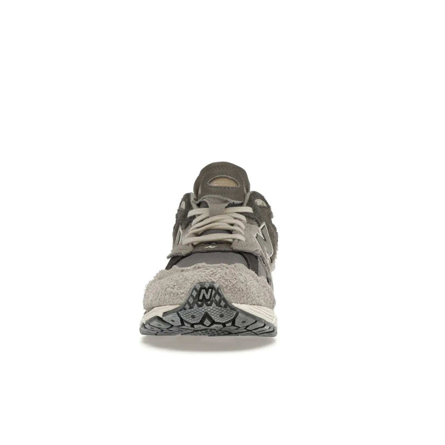 New Balance 2002R Protection Pack Rain Cloud - Image 11 - Only at www.BallersClubKickz.com - The New Balance 2002R Protection Pack Rain Cloud combines style and comfort. Featuring a grey mesh upper, jagged suede overlays and a reflective logo, a vibrant rain cloud motif on the heel stands out! Not just good-looking, the Nrgy midsole and soft grey outsole provide cushioning and comfort. Make a statement with the iconic New Balance 2002R Protection Pack Rain Cloud.
