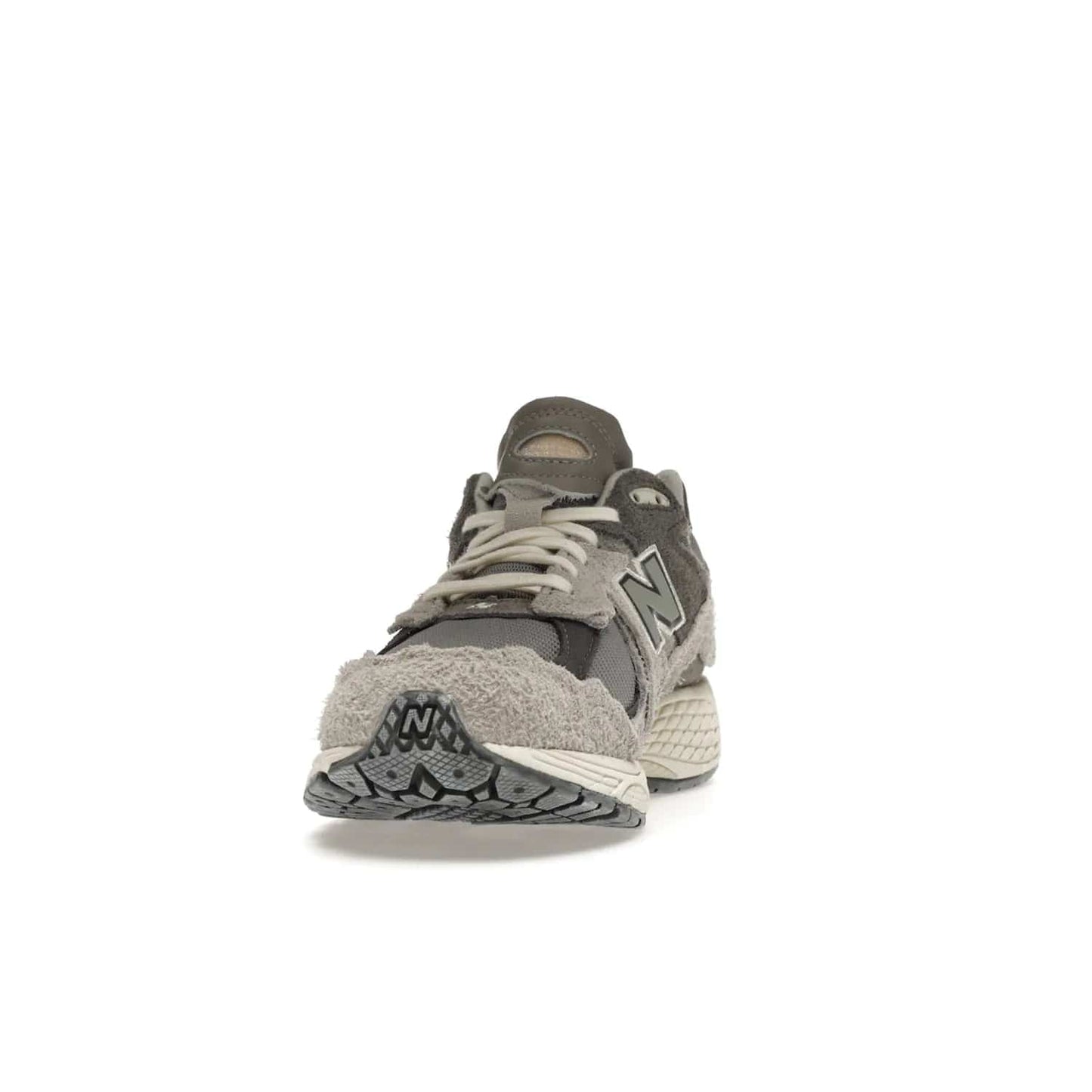 New Balance 2002R Protection Pack Rain Cloud - Image 12 - Only at www.BallersClubKickz.com - The New Balance 2002R Protection Pack Rain Cloud combines style and comfort. Featuring a grey mesh upper, jagged suede overlays and a reflective logo, a vibrant rain cloud motif on the heel stands out! Not just good-looking, the Nrgy midsole and soft grey outsole provide cushioning and comfort. Make a statement with the iconic New Balance 2002R Protection Pack Rain Cloud.