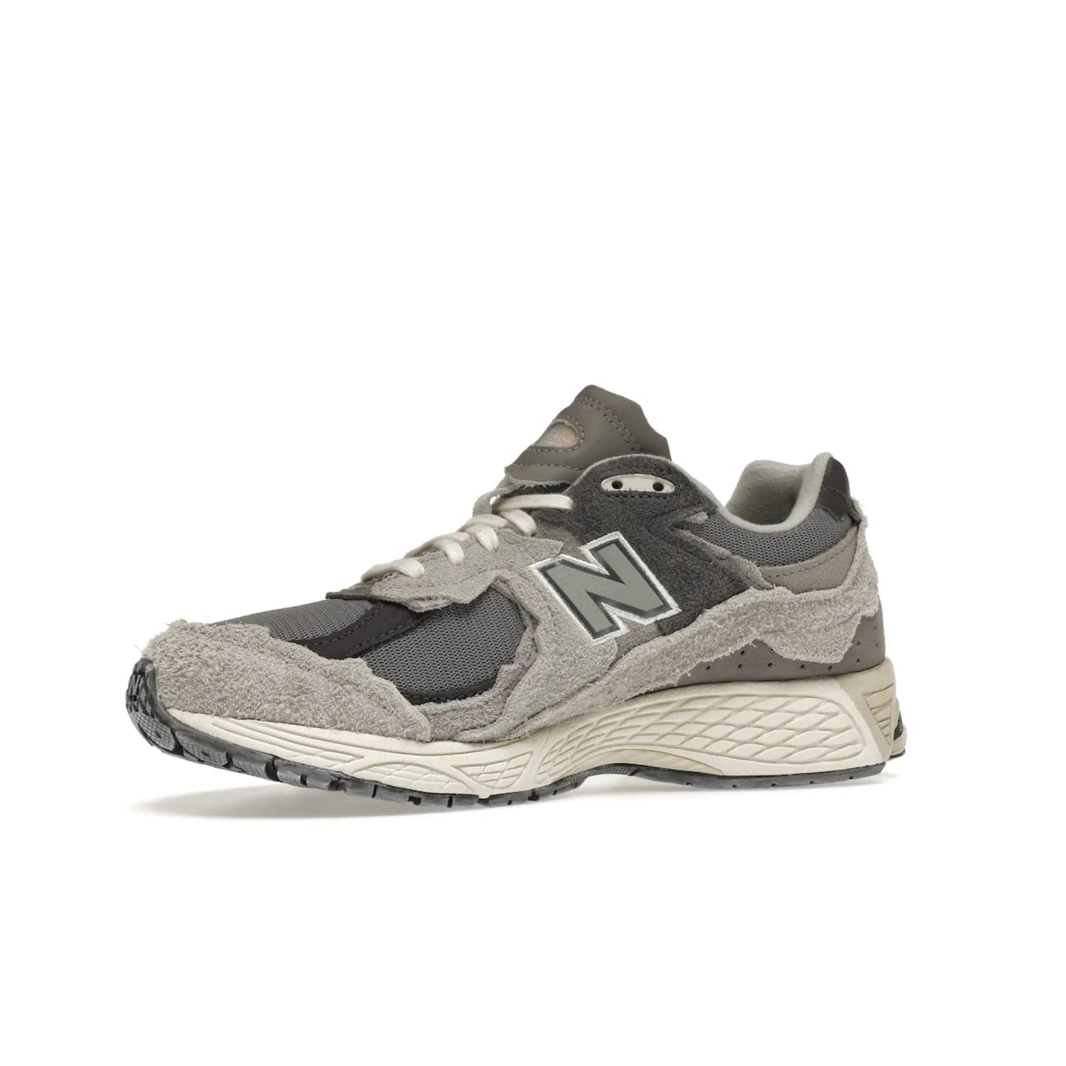 New Balance 2002R Protection Pack Rain Cloud - Image 17 - Only at www.BallersClubKickz.com - The New Balance 2002R Protection Pack Rain Cloud combines style and comfort. Featuring a grey mesh upper, jagged suede overlays and a reflective logo, a vibrant rain cloud motif on the heel stands out! Not just good-looking, the Nrgy midsole and soft grey outsole provide cushioning and comfort. Make a statement with the iconic New Balance 2002R Protection Pack Rain Cloud.
