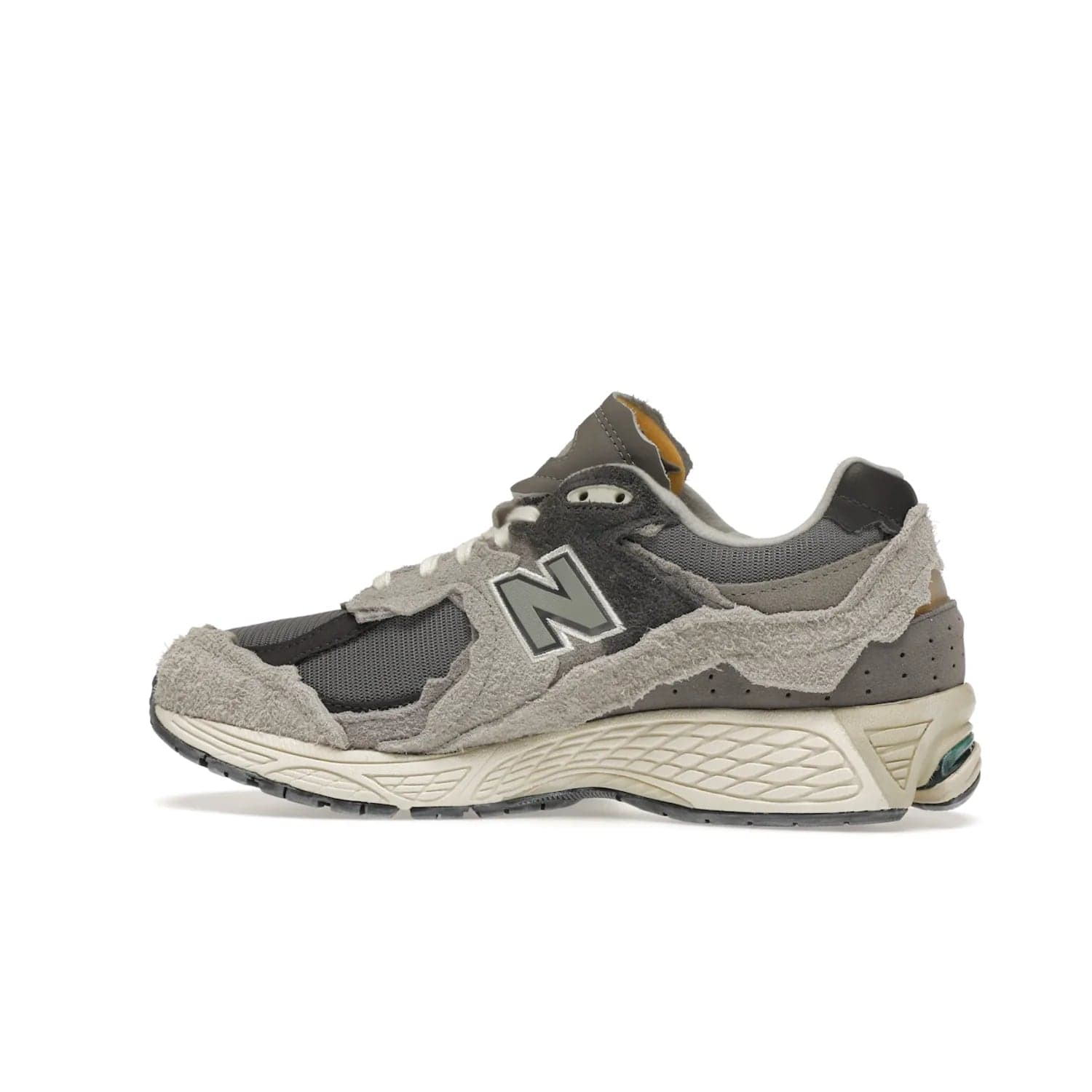 New Balance 2002R Protection Pack Rain Cloud - Image 21 - Only at www.BallersClubKickz.com - The New Balance 2002R Protection Pack Rain Cloud combines style and comfort. Featuring a grey mesh upper, jagged suede overlays and a reflective logo, a vibrant rain cloud motif on the heel stands out! Not just good-looking, the Nrgy midsole and soft grey outsole provide cushioning and comfort. Make a statement with the iconic New Balance 2002R Protection Pack Rain Cloud.