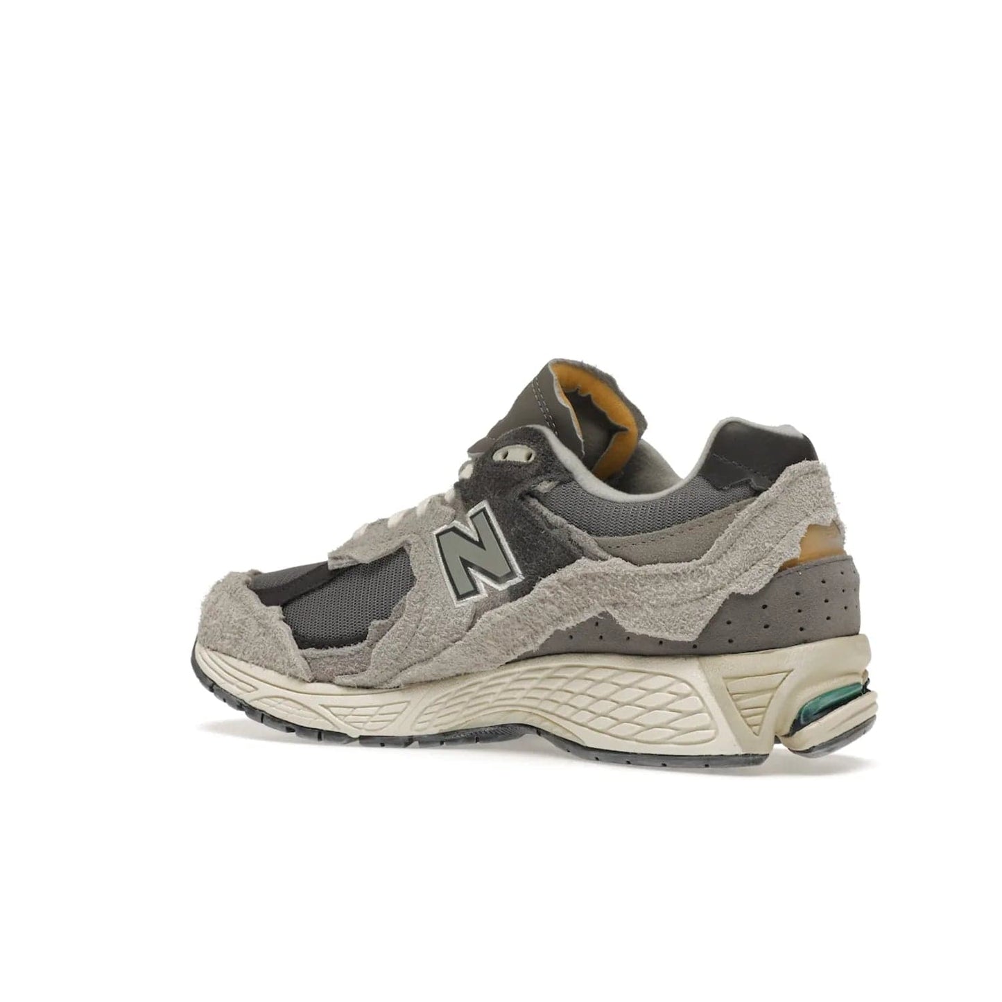 New Balance 2002R Protection Pack Rain Cloud - Image 23 - Only at www.BallersClubKickz.com - The New Balance 2002R Protection Pack Rain Cloud combines style and comfort. Featuring a grey mesh upper, jagged suede overlays and a reflective logo, a vibrant rain cloud motif on the heel stands out! Not just good-looking, the Nrgy midsole and soft grey outsole provide cushioning and comfort. Make a statement with the iconic New Balance 2002R Protection Pack Rain Cloud.