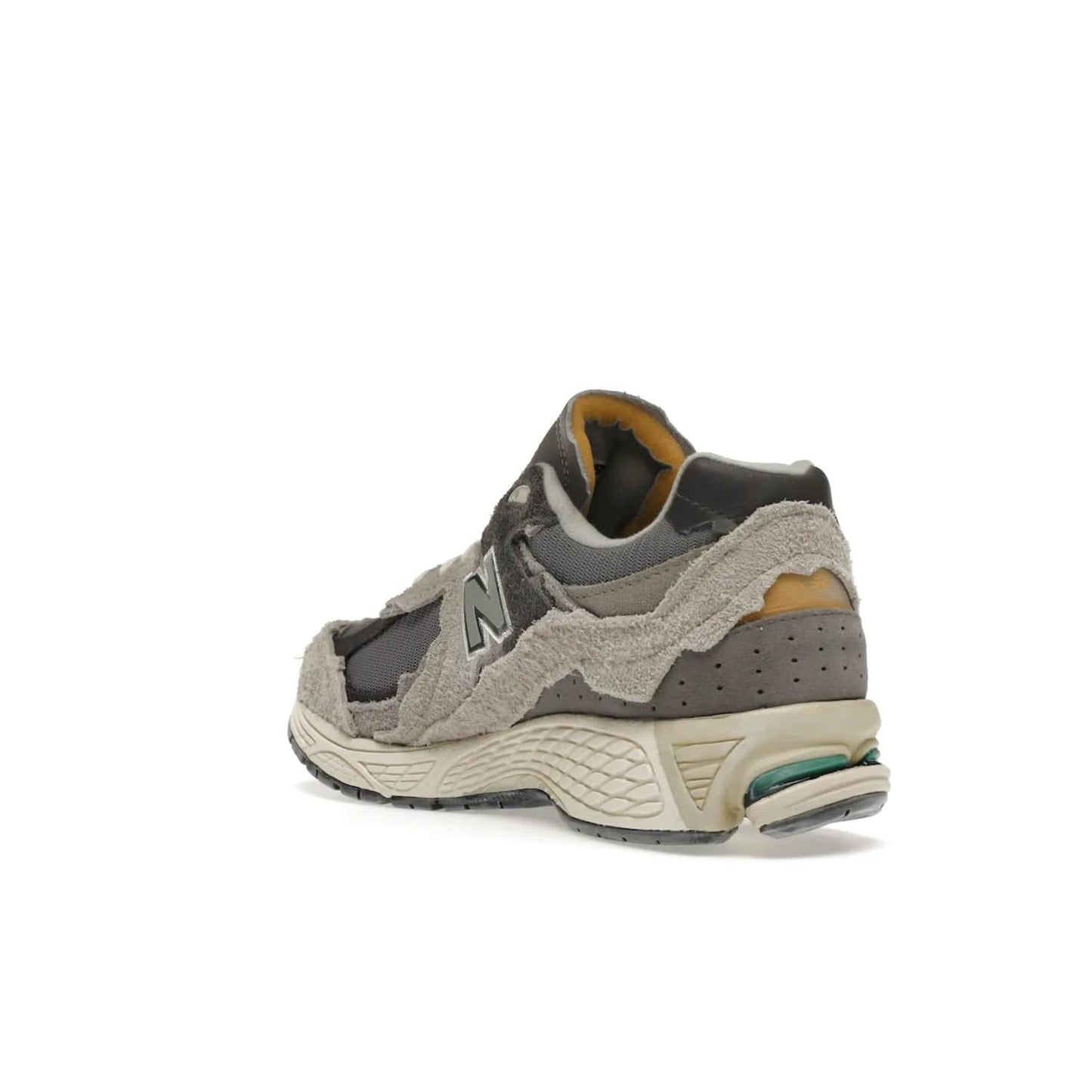 New Balance 2002R Protection Pack Rain Cloud - Image 25 - Only at www.BallersClubKickz.com - The New Balance 2002R Protection Pack Rain Cloud combines style and comfort. Featuring a grey mesh upper, jagged suede overlays and a reflective logo, a vibrant rain cloud motif on the heel stands out! Not just good-looking, the Nrgy midsole and soft grey outsole provide cushioning and comfort. Make a statement with the iconic New Balance 2002R Protection Pack Rain Cloud.