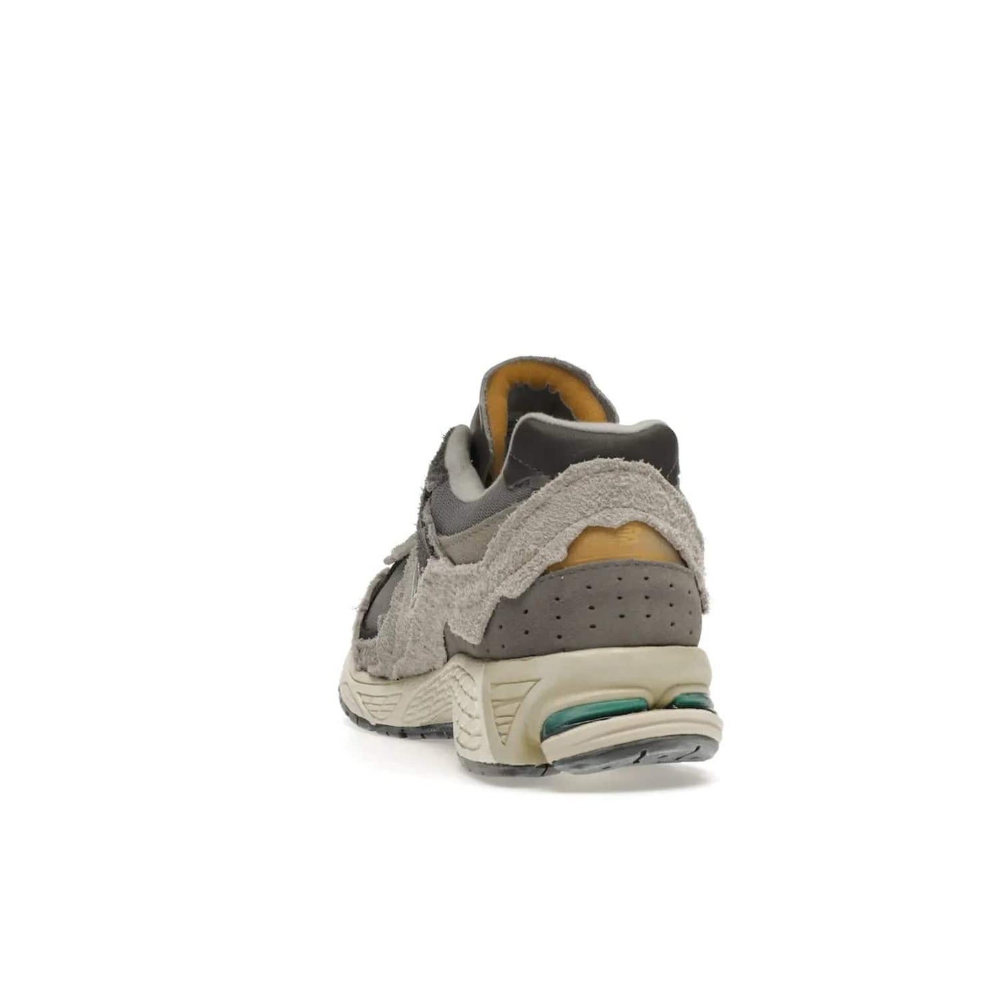 New Balance 2002R Protection Pack Rain Cloud - Image 27 - Only at www.BallersClubKickz.com - The New Balance 2002R Protection Pack Rain Cloud combines style and comfort. Featuring a grey mesh upper, jagged suede overlays and a reflective logo, a vibrant rain cloud motif on the heel stands out! Not just good-looking, the Nrgy midsole and soft grey outsole provide cushioning and comfort. Make a statement with the iconic New Balance 2002R Protection Pack Rain Cloud.