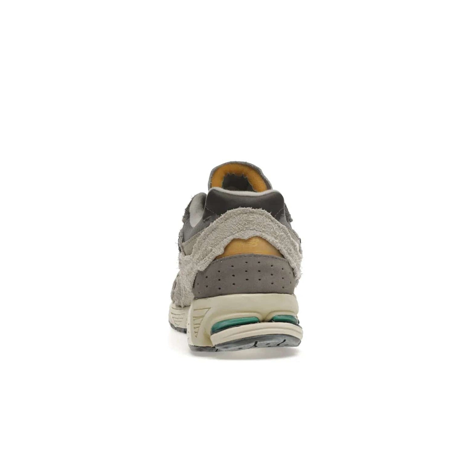 New Balance 2002R Protection Pack Rain Cloud - Image 28 - Only at www.BallersClubKickz.com - The New Balance 2002R Protection Pack Rain Cloud combines style and comfort. Featuring a grey mesh upper, jagged suede overlays and a reflective logo, a vibrant rain cloud motif on the heel stands out! Not just good-looking, the Nrgy midsole and soft grey outsole provide cushioning and comfort. Make a statement with the iconic New Balance 2002R Protection Pack Rain Cloud.