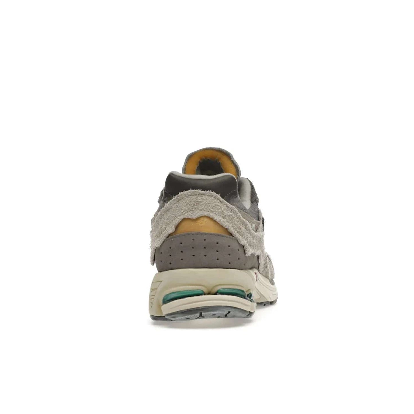 New Balance 2002R Protection Pack Rain Cloud - Image 29 - Only at www.BallersClubKickz.com - The New Balance 2002R Protection Pack Rain Cloud combines style and comfort. Featuring a grey mesh upper, jagged suede overlays and a reflective logo, a vibrant rain cloud motif on the heel stands out! Not just good-looking, the Nrgy midsole and soft grey outsole provide cushioning and comfort. Make a statement with the iconic New Balance 2002R Protection Pack Rain Cloud.