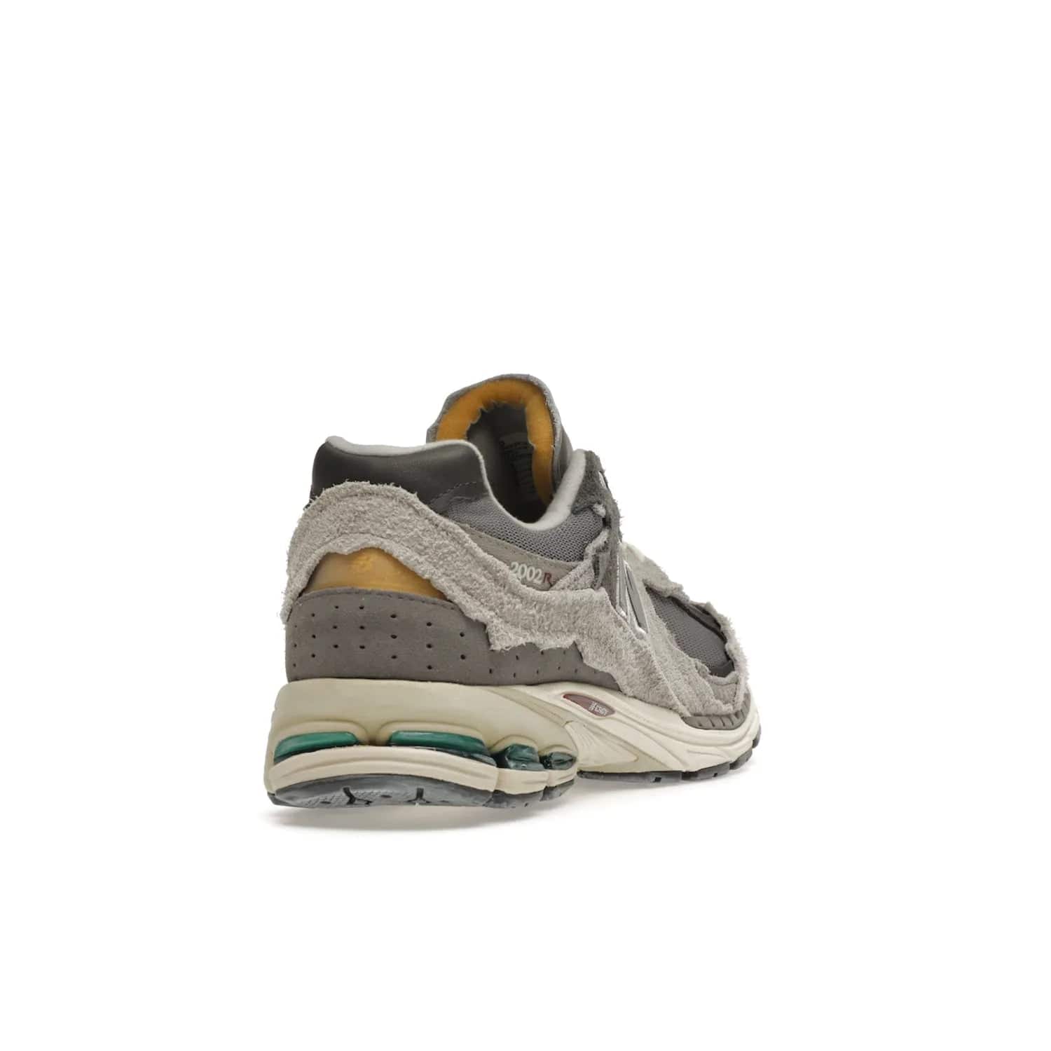 New Balance 2002R Protection Pack Rain Cloud - Image 31 - Only at www.BallersClubKickz.com - The New Balance 2002R Protection Pack Rain Cloud combines style and comfort. Featuring a grey mesh upper, jagged suede overlays and a reflective logo, a vibrant rain cloud motif on the heel stands out! Not just good-looking, the Nrgy midsole and soft grey outsole provide cushioning and comfort. Make a statement with the iconic New Balance 2002R Protection Pack Rain Cloud.