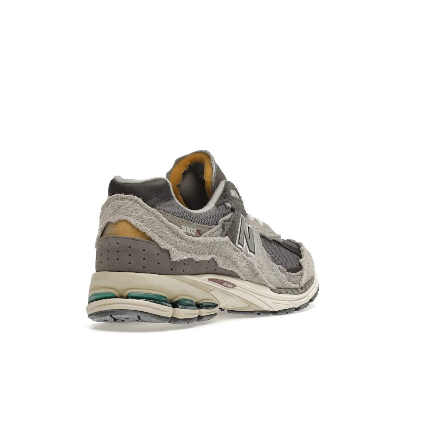 New Balance 2002R Protection Pack Rain Cloud - Image 32 - Only at www.BallersClubKickz.com - The New Balance 2002R Protection Pack Rain Cloud combines style and comfort. Featuring a grey mesh upper, jagged suede overlays and a reflective logo, a vibrant rain cloud motif on the heel stands out! Not just good-looking, the Nrgy midsole and soft grey outsole provide cushioning and comfort. Make a statement with the iconic New Balance 2002R Protection Pack Rain Cloud.