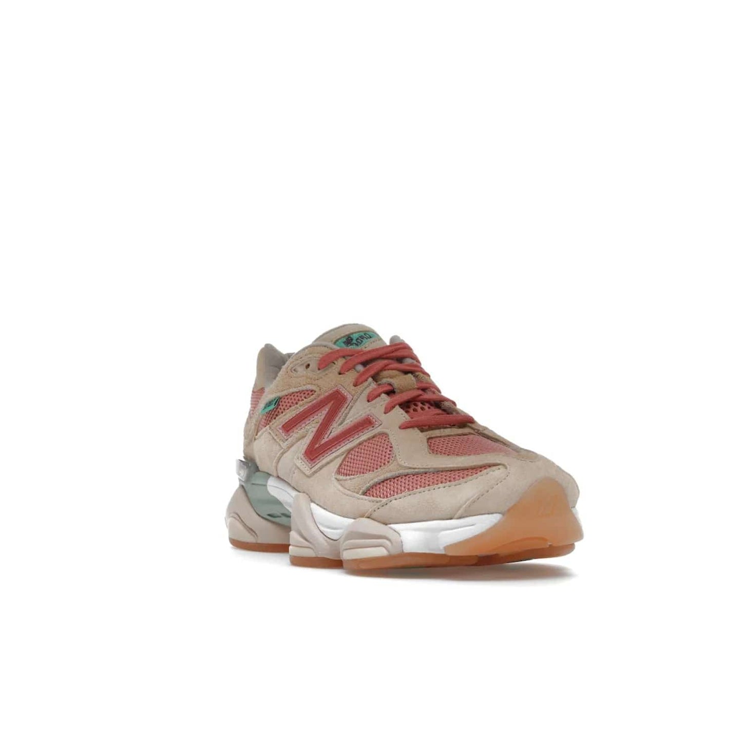 New Balance 9060 Joe Freshgoods Inside Voices Penny Cookie Pink - Image 7 - Only at www.BallersClubKickz.com - Introducing the New Balance 9060 Joe Freshgoods Inside Voices Cookie Pink. A stylish and comfortable sneaker featuring an ivory cream and blossom mesh construction, light brown suede overlays, New Balance logos, and "Inside Voices" embroidery. A white, green and beige sculptural sole finishes the look.