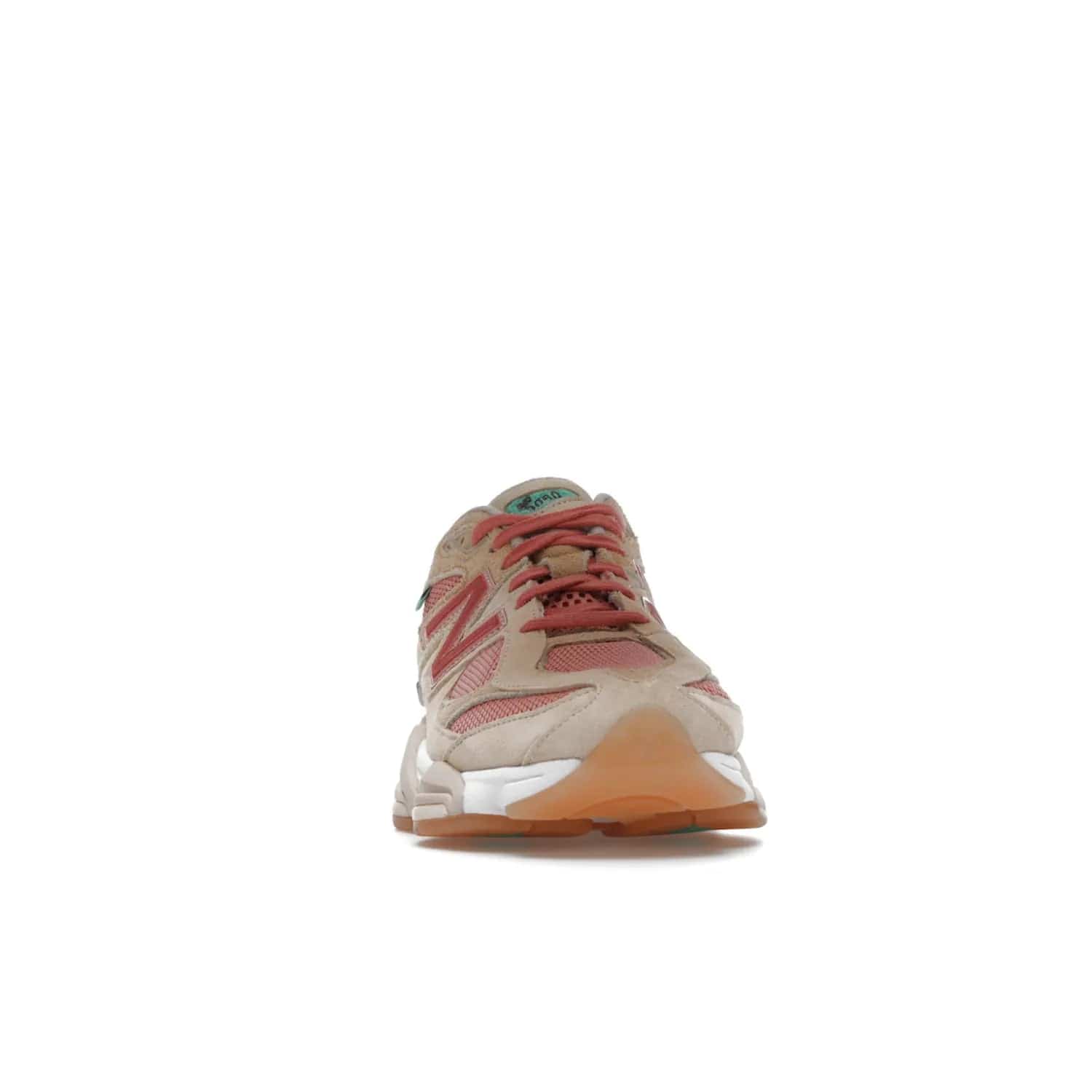 New Balance 9060 Joe Freshgoods Inside Voices Penny Cookie Pink - Image 9 - Only at www.BallersClubKickz.com - Introducing the New Balance 9060 Joe Freshgoods Inside Voices Cookie Pink. A stylish and comfortable sneaker featuring an ivory cream and blossom mesh construction, light brown suede overlays, New Balance logos, and "Inside Voices" embroidery. A white, green and beige sculptural sole finishes the look.