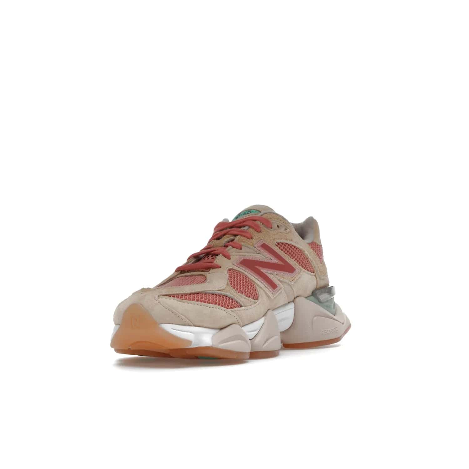 New Balance 9060 Joe Freshgoods Inside Voices Penny Cookie Pink - Image 13 - Only at www.BallersClubKickz.com - Introducing the New Balance 9060 Joe Freshgoods Inside Voices Cookie Pink. A stylish and comfortable sneaker featuring an ivory cream and blossom mesh construction, light brown suede overlays, New Balance logos, and "Inside Voices" embroidery. A white, green and beige sculptural sole finishes the look.