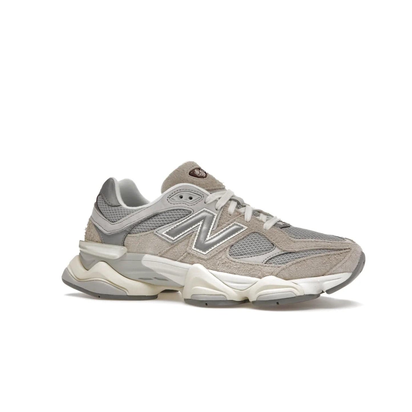 New Balance 9060 Lunar New Year Timberwolf Grey - Image 3 - Only at www.BallersClubKickz.com - This New Balance 9060 Lunar New Year Timberwolf Grey features a mesh upper and furry suede overlays in a stylish Timberwolf/Rain Cloud/Silver Metallic colorway. Its contemporary design includes ABZORB and SBS cushioning, a chunky rubber sole, and a lace-up front. Crafted to offer nothing but the best in style and comfort, the shoe released on 2nd January 2023.