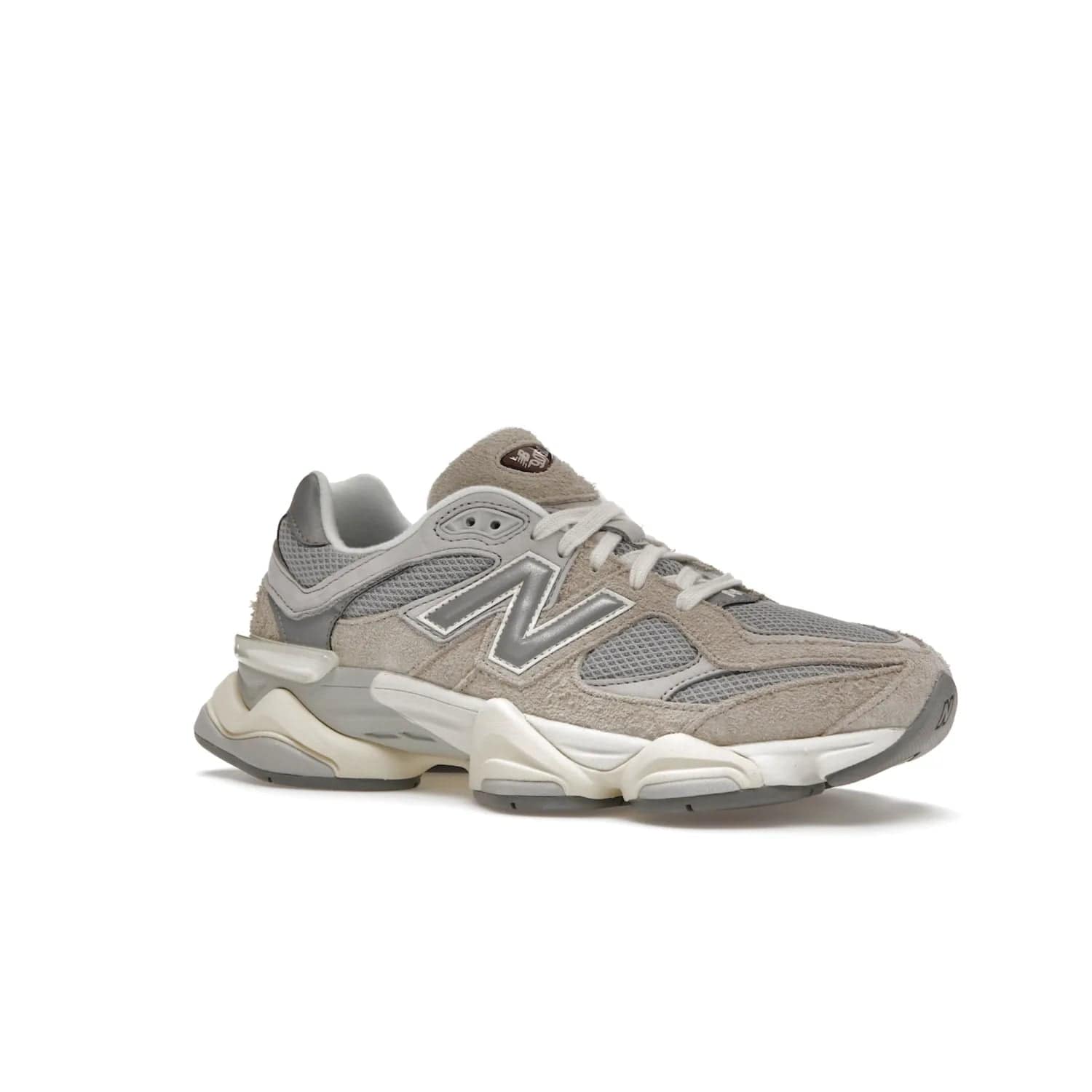 New Balance 9060 Lunar New Year Timberwolf Grey - Image 4 - Only at www.BallersClubKickz.com - This New Balance 9060 Lunar New Year Timberwolf Grey features a mesh upper and furry suede overlays in a stylish Timberwolf/Rain Cloud/Silver Metallic colorway. Its contemporary design includes ABZORB and SBS cushioning, a chunky rubber sole, and a lace-up front. Crafted to offer nothing but the best in style and comfort, the shoe released on 2nd January 2023.