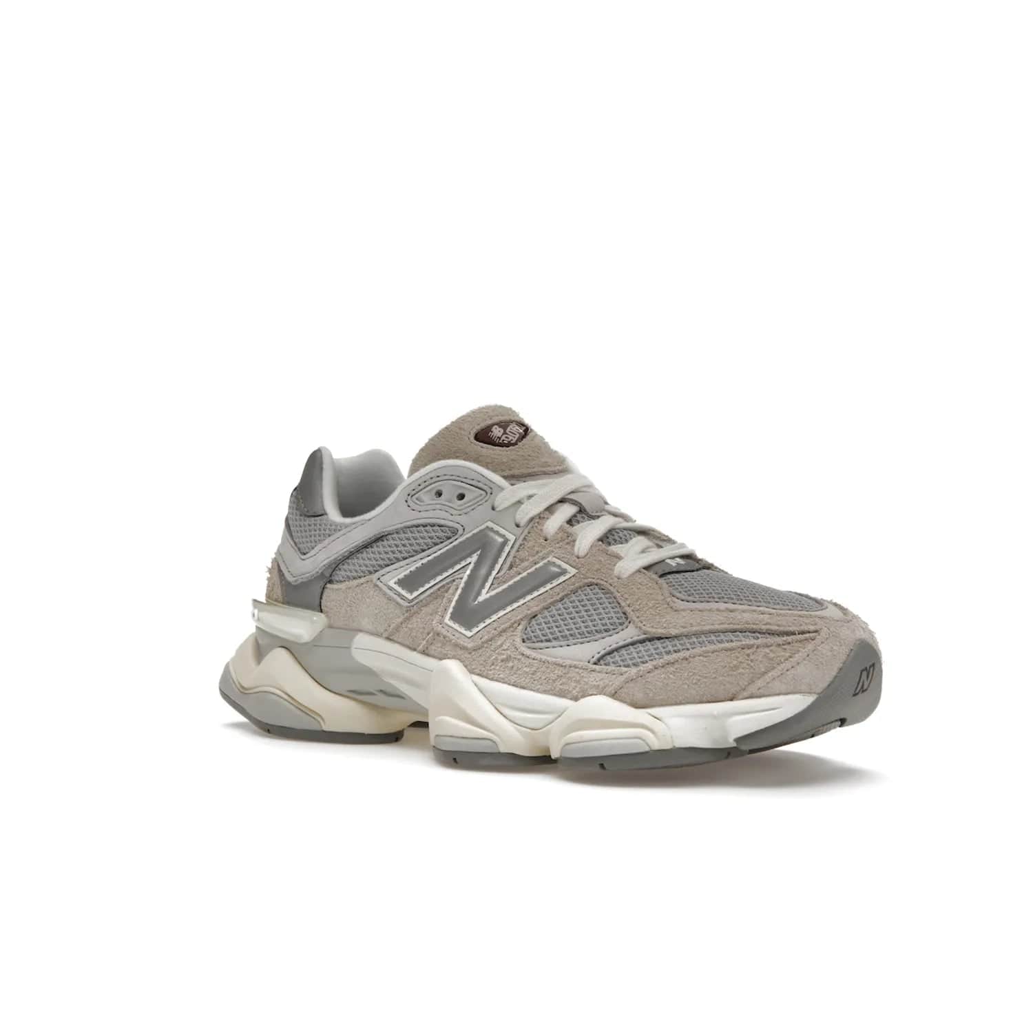 New Balance 9060 Lunar New Year Timberwolf Grey - Image 5 - Only at www.BallersClubKickz.com - This New Balance 9060 Lunar New Year Timberwolf Grey features a mesh upper and furry suede overlays in a stylish Timberwolf/Rain Cloud/Silver Metallic colorway. Its contemporary design includes ABZORB and SBS cushioning, a chunky rubber sole, and a lace-up front. Crafted to offer nothing but the best in style and comfort, the shoe released on 2nd January 2023.