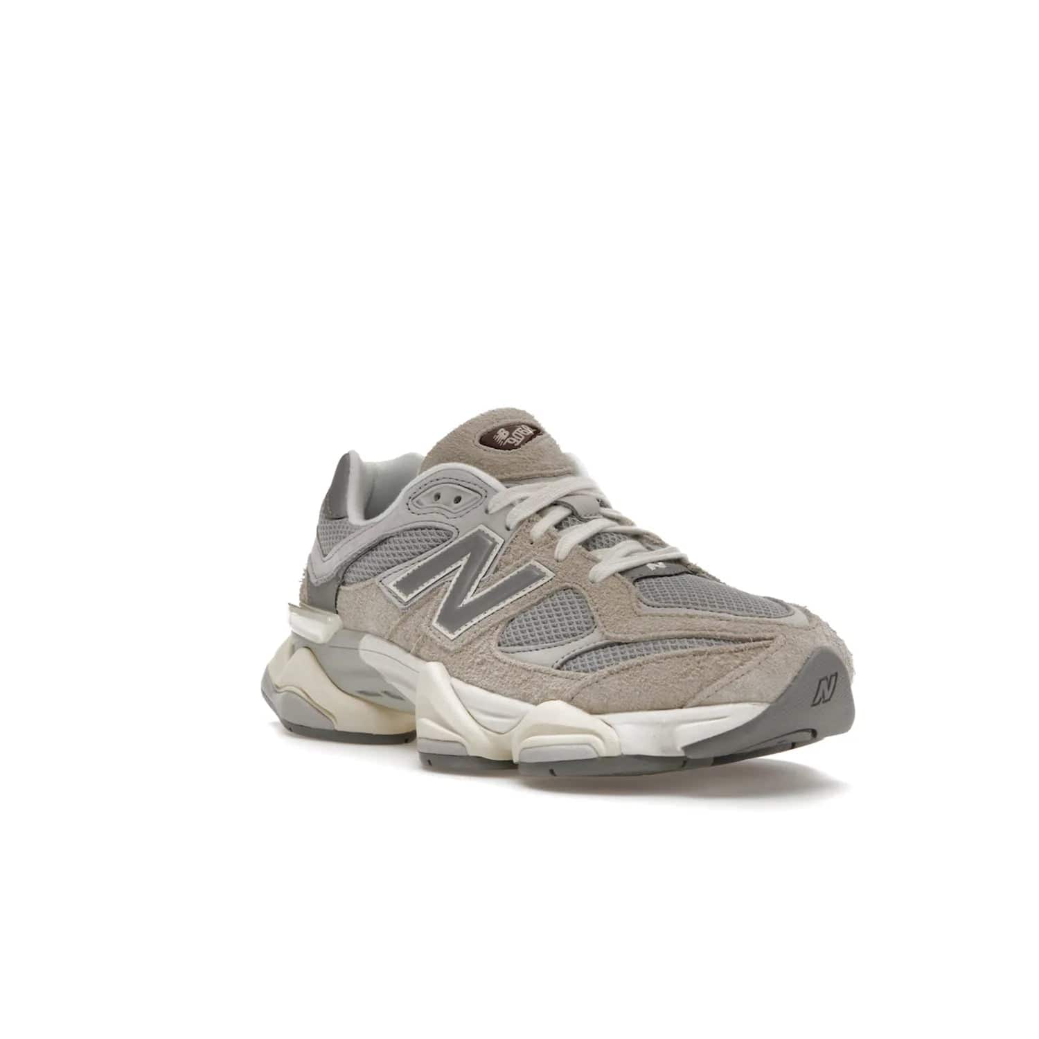 New Balance 9060 Lunar New Year Timberwolf Grey - Image 6 - Only at www.BallersClubKickz.com - This New Balance 9060 Lunar New Year Timberwolf Grey features a mesh upper and furry suede overlays in a stylish Timberwolf/Rain Cloud/Silver Metallic colorway. Its contemporary design includes ABZORB and SBS cushioning, a chunky rubber sole, and a lace-up front. Crafted to offer nothing but the best in style and comfort, the shoe released on 2nd January 2023.