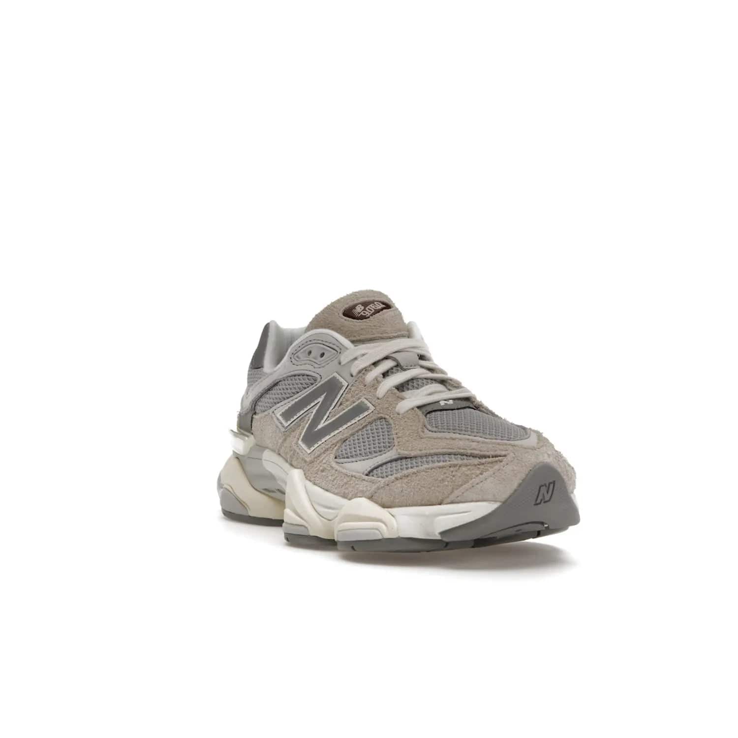 New Balance 9060 Lunar New Year Timberwolf Grey - Image 7 - Only at www.BallersClubKickz.com - This New Balance 9060 Lunar New Year Timberwolf Grey features a mesh upper and furry suede overlays in a stylish Timberwolf/Rain Cloud/Silver Metallic colorway. Its contemporary design includes ABZORB and SBS cushioning, a chunky rubber sole, and a lace-up front. Crafted to offer nothing but the best in style and comfort, the shoe released on 2nd January 2023.