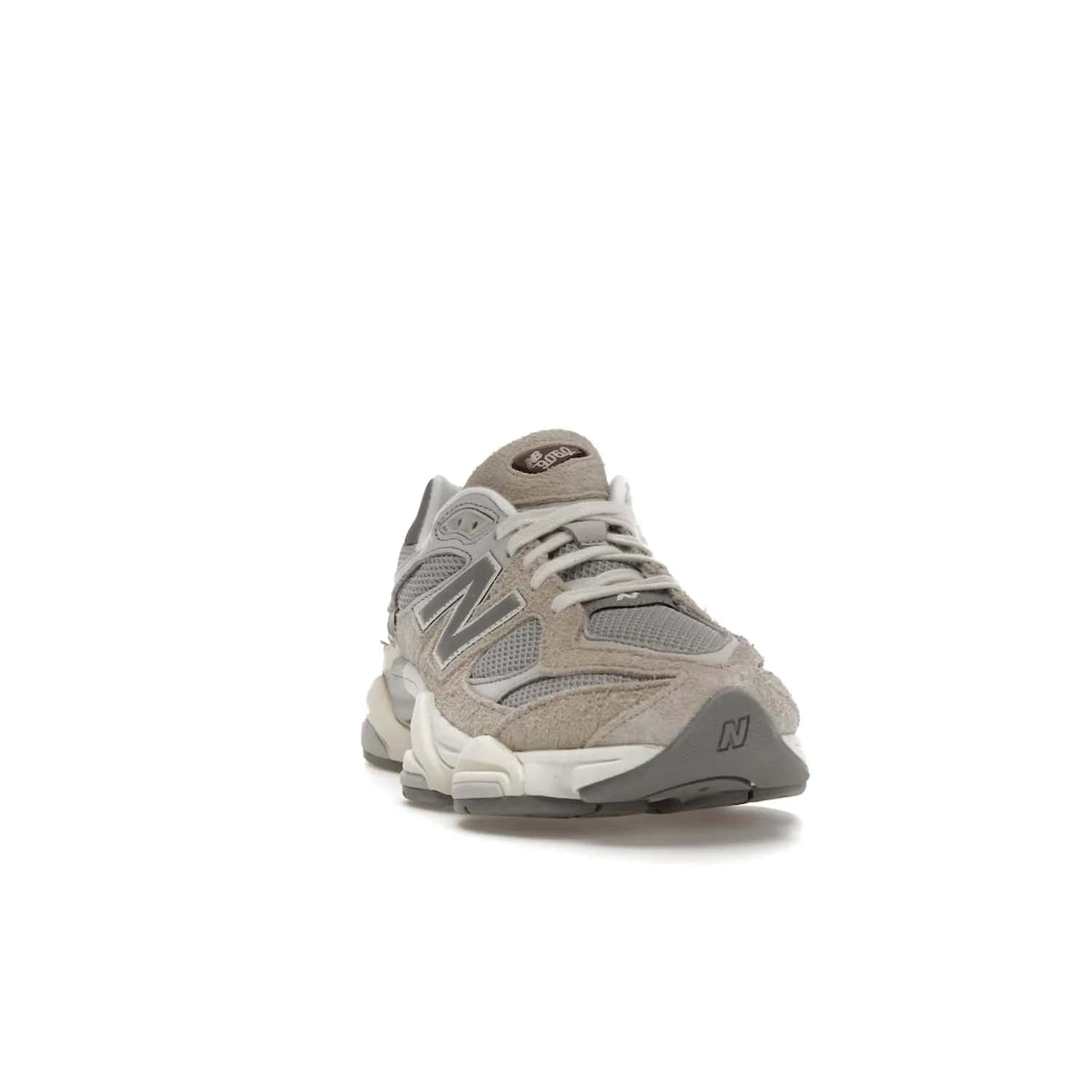 New Balance 9060 Lunar New Year Timberwolf Grey - Image 8 - Only at www.BallersClubKickz.com - This New Balance 9060 Lunar New Year Timberwolf Grey features a mesh upper and furry suede overlays in a stylish Timberwolf/Rain Cloud/Silver Metallic colorway. Its contemporary design includes ABZORB and SBS cushioning, a chunky rubber sole, and a lace-up front. Crafted to offer nothing but the best in style and comfort, the shoe released on 2nd January 2023.