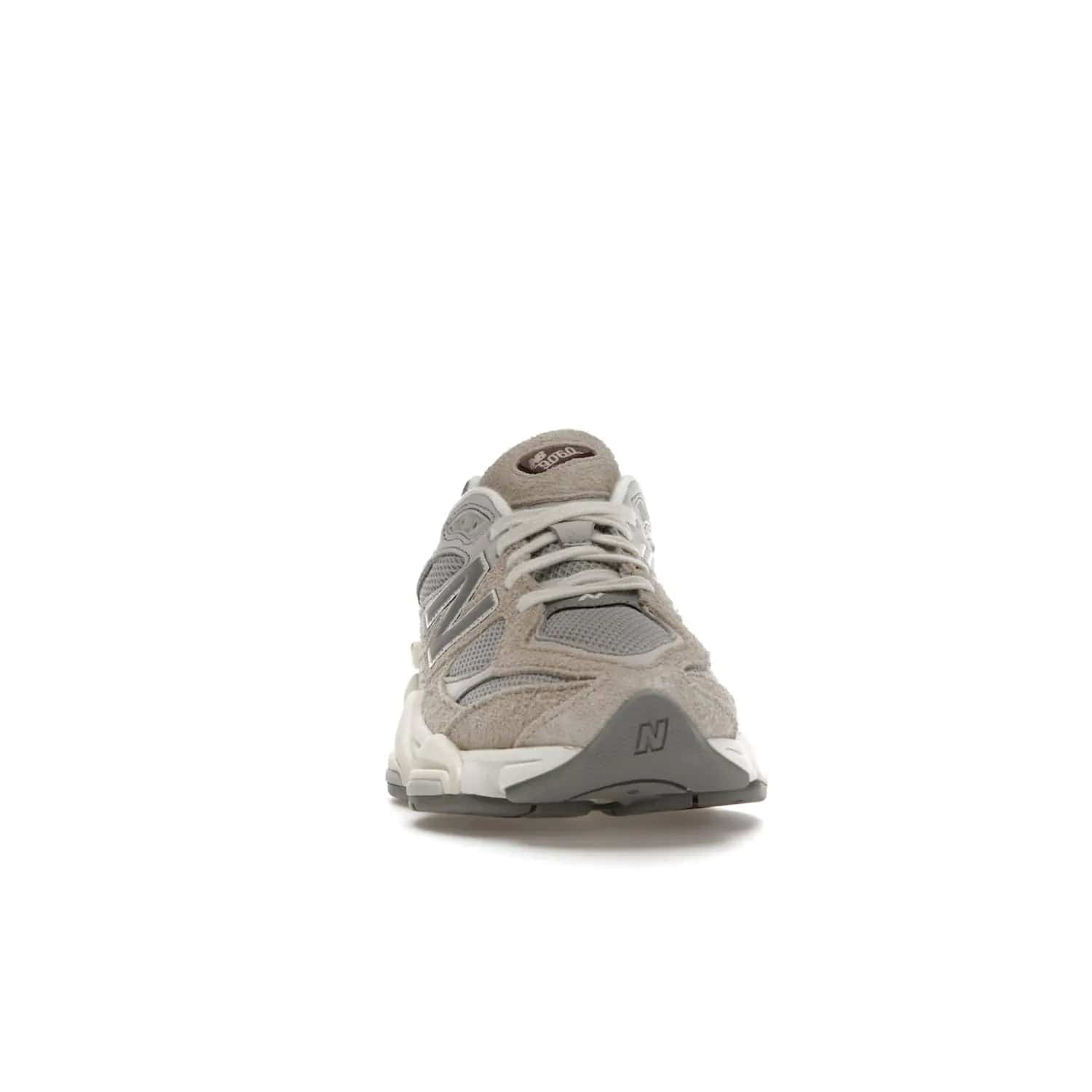 New Balance 9060 Lunar New Year Timberwolf Grey - Image 9 - Only at www.BallersClubKickz.com - This New Balance 9060 Lunar New Year Timberwolf Grey features a mesh upper and furry suede overlays in a stylish Timberwolf/Rain Cloud/Silver Metallic colorway. Its contemporary design includes ABZORB and SBS cushioning, a chunky rubber sole, and a lace-up front. Crafted to offer nothing but the best in style and comfort, the shoe released on 2nd January 2023.
