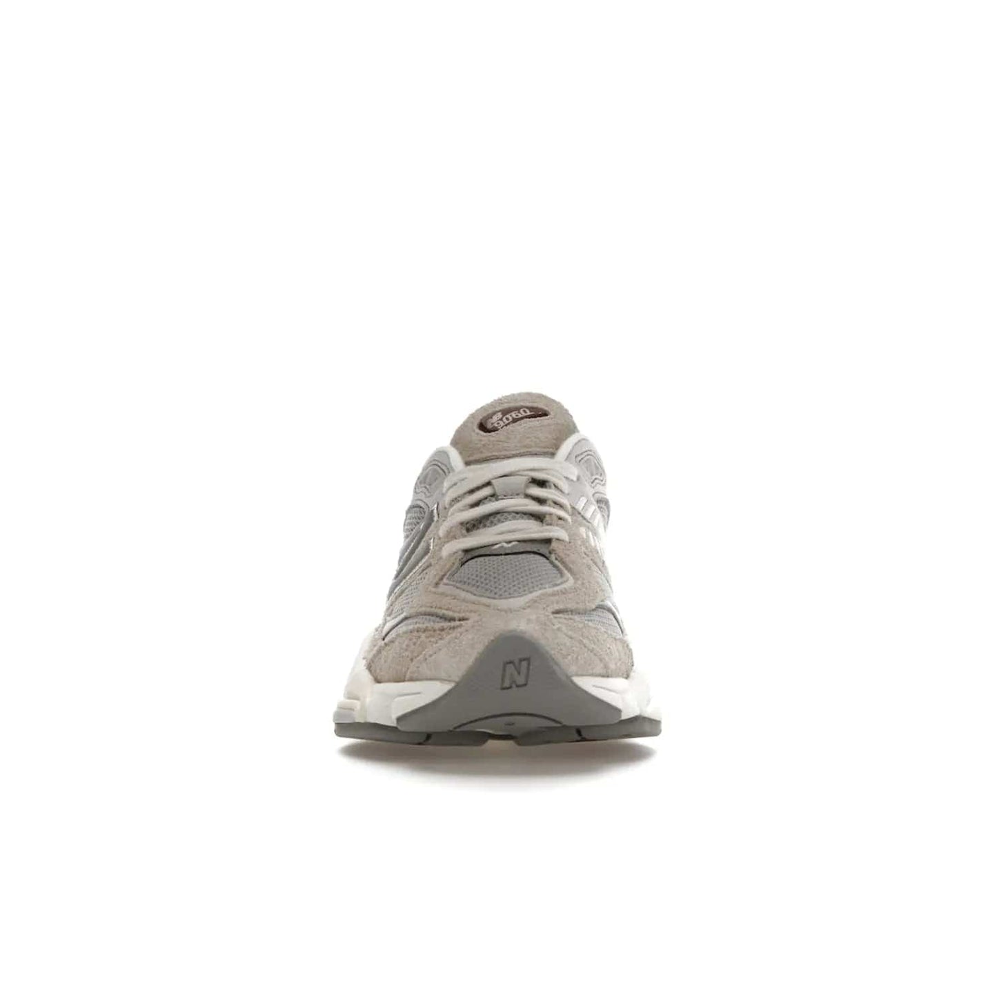 New Balance 9060 Lunar New Year Timberwolf Grey - Image 10 - Only at www.BallersClubKickz.com - This New Balance 9060 Lunar New Year Timberwolf Grey features a mesh upper and furry suede overlays in a stylish Timberwolf/Rain Cloud/Silver Metallic colorway. Its contemporary design includes ABZORB and SBS cushioning, a chunky rubber sole, and a lace-up front. Crafted to offer nothing but the best in style and comfort, the shoe released on 2nd January 2023.