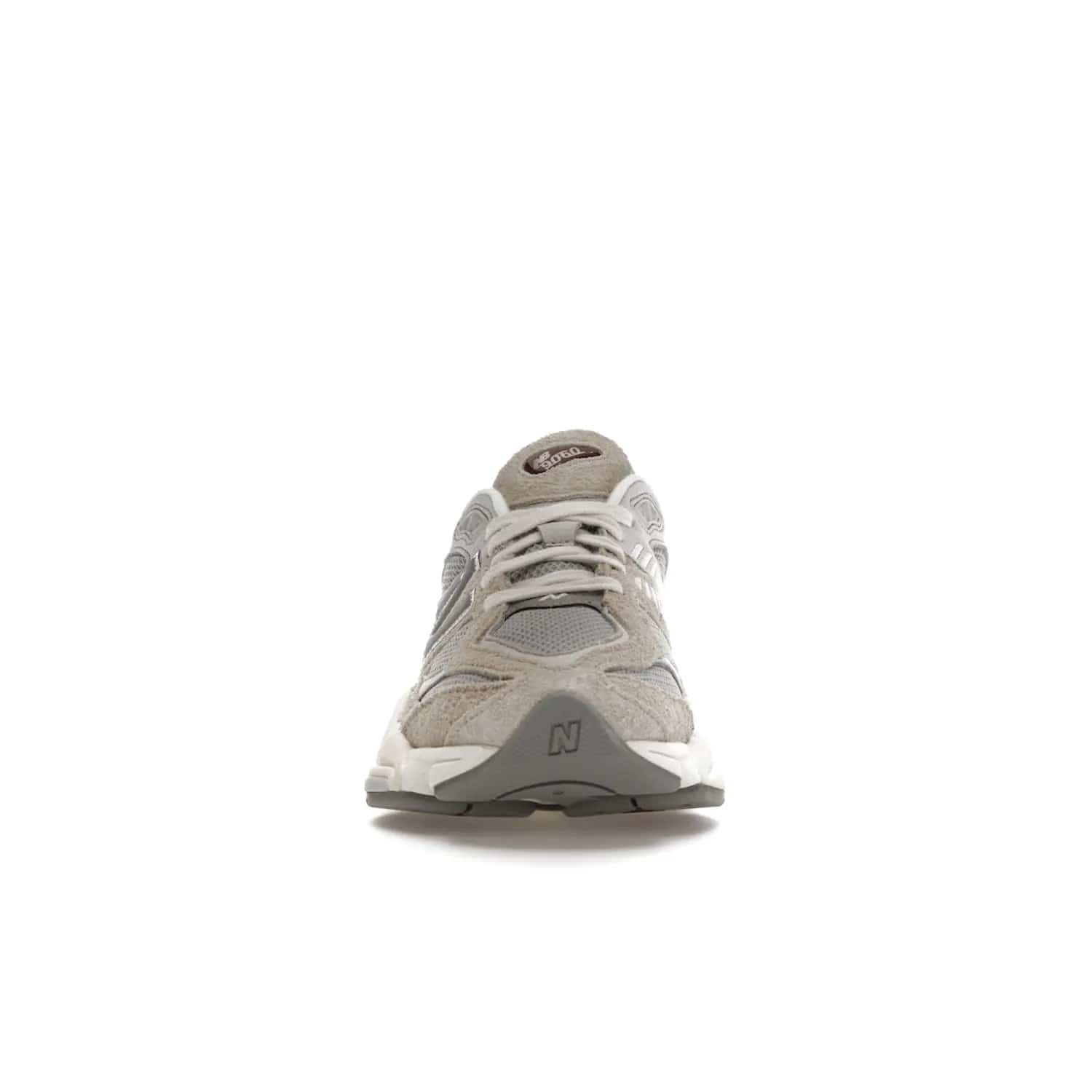 New Balance 9060 Lunar New Year Timberwolf Grey - Image 10 - Only at www.BallersClubKickz.com - This New Balance 9060 Lunar New Year Timberwolf Grey features a mesh upper and furry suede overlays in a stylish Timberwolf/Rain Cloud/Silver Metallic colorway. Its contemporary design includes ABZORB and SBS cushioning, a chunky rubber sole, and a lace-up front. Crafted to offer nothing but the best in style and comfort, the shoe released on 2nd January 2023.