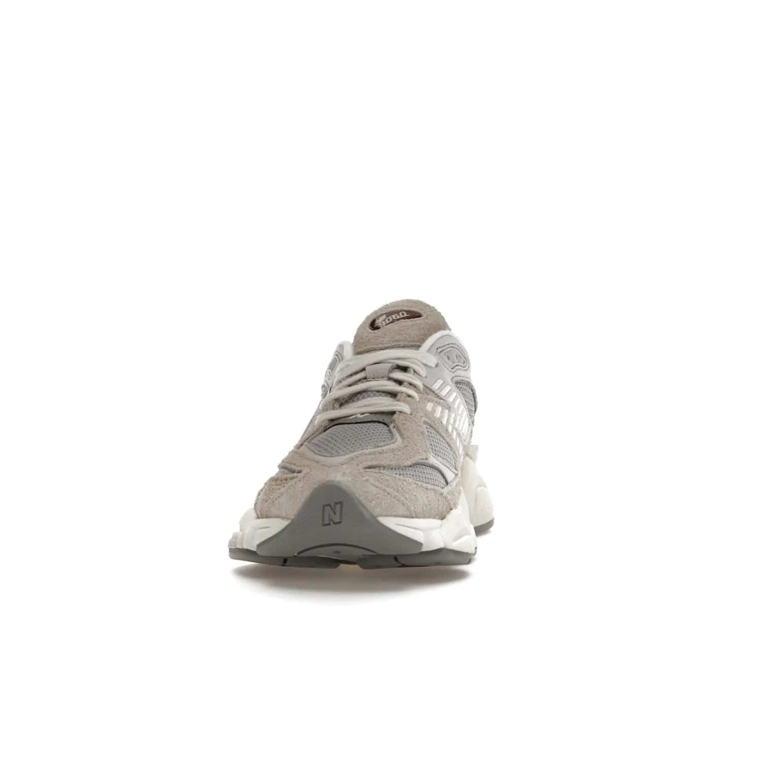 New Balance 9060 Lunar New Year Timberwolf Grey - Image 11 - Only at www.BallersClubKickz.com - This New Balance 9060 Lunar New Year Timberwolf Grey features a mesh upper and furry suede overlays in a stylish Timberwolf/Rain Cloud/Silver Metallic colorway. Its contemporary design includes ABZORB and SBS cushioning, a chunky rubber sole, and a lace-up front. Crafted to offer nothing but the best in style and comfort, the shoe released on 2nd January 2023.