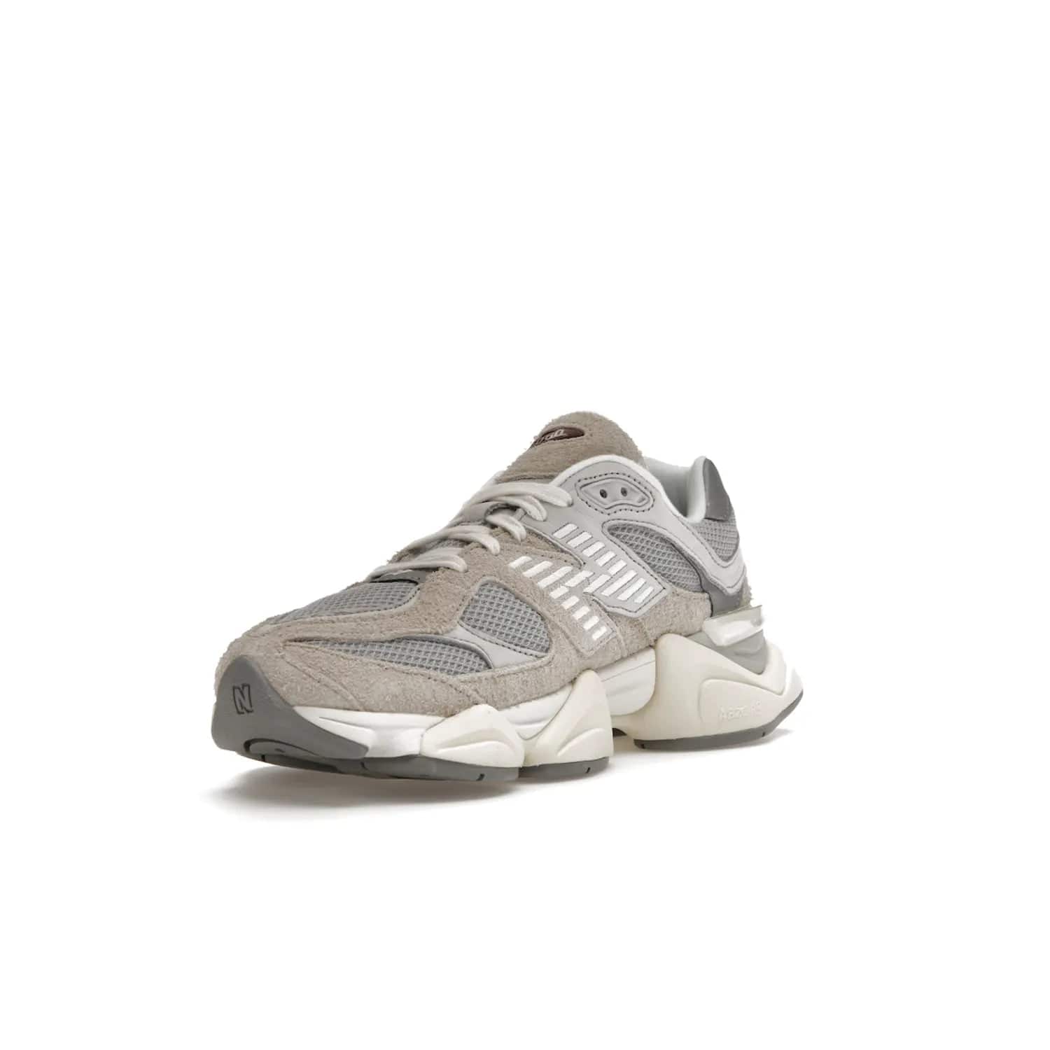 New Balance 9060 Lunar New Year Timberwolf Grey - Image 14 - Only at www.BallersClubKickz.com - This New Balance 9060 Lunar New Year Timberwolf Grey features a mesh upper and furry suede overlays in a stylish Timberwolf/Rain Cloud/Silver Metallic colorway. Its contemporary design includes ABZORB and SBS cushioning, a chunky rubber sole, and a lace-up front. Crafted to offer nothing but the best in style and comfort, the shoe released on 2nd January 2023.