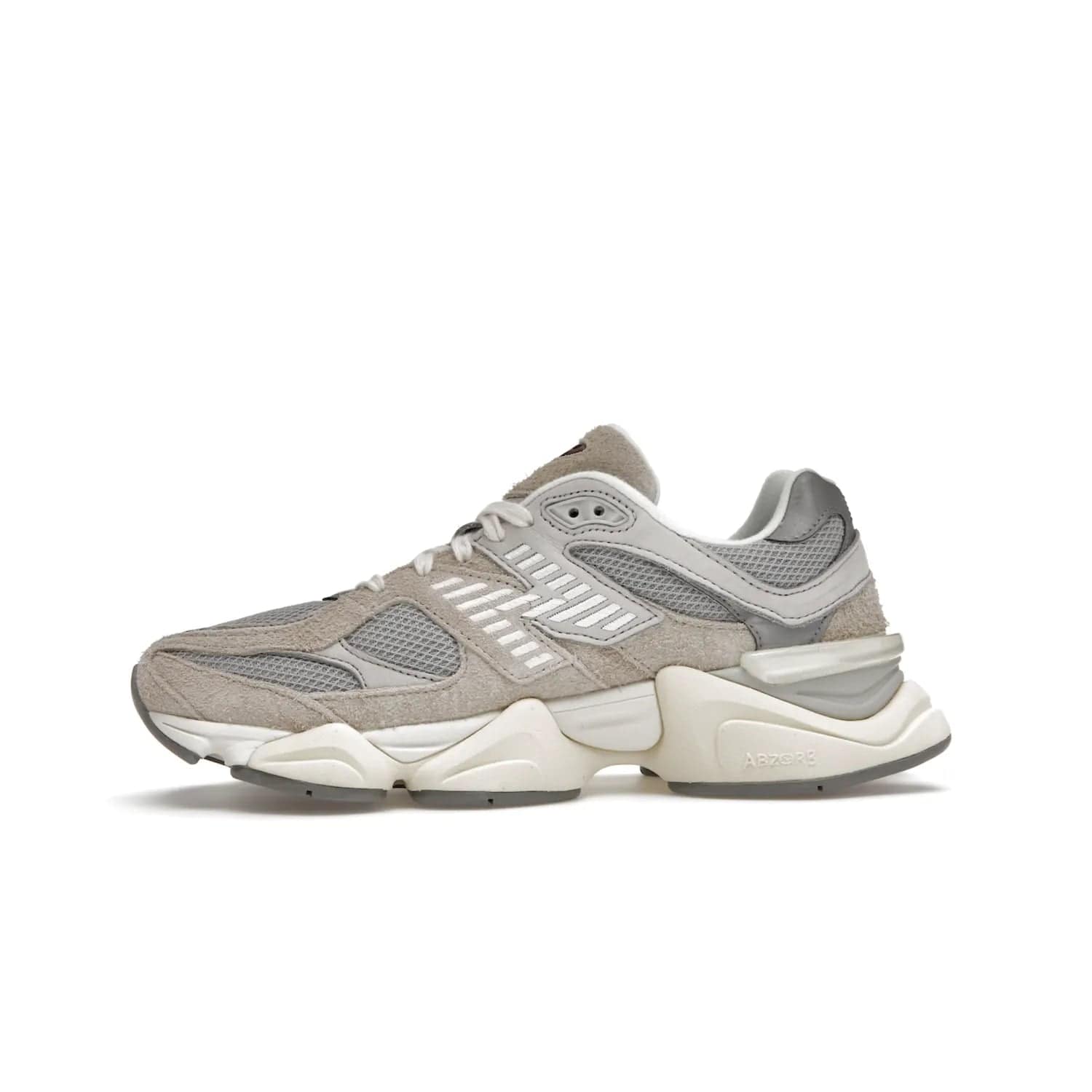 New Balance 9060 Lunar New Year Timberwolf Grey - Image 18 - Only at www.BallersClubKickz.com - This New Balance 9060 Lunar New Year Timberwolf Grey features a mesh upper and furry suede overlays in a stylish Timberwolf/Rain Cloud/Silver Metallic colorway. Its contemporary design includes ABZORB and SBS cushioning, a chunky rubber sole, and a lace-up front. Crafted to offer nothing but the best in style and comfort, the shoe released on 2nd January 2023.