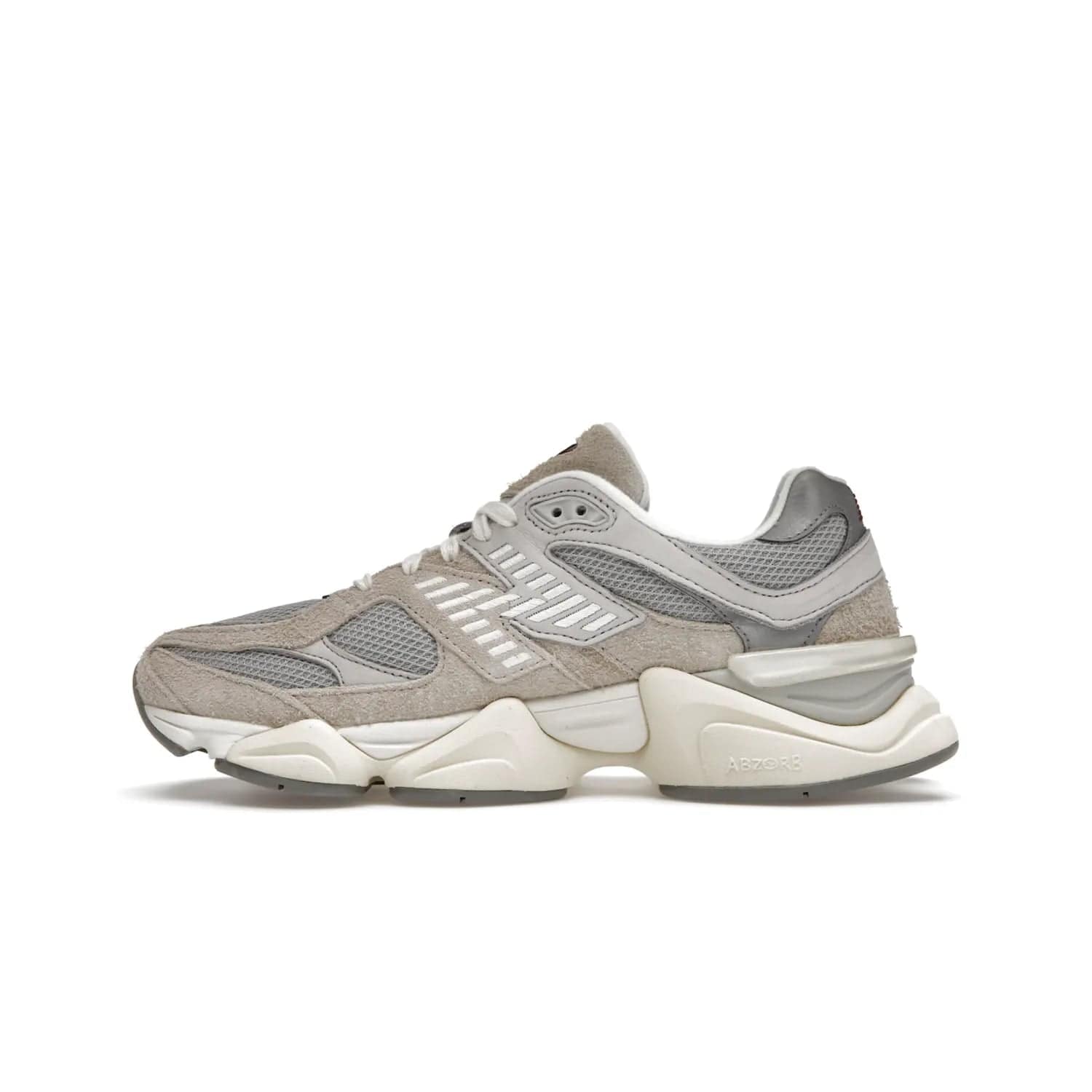 New Balance 9060 Lunar New Year Timberwolf Grey - Image 19 - Only at www.BallersClubKickz.com - This New Balance 9060 Lunar New Year Timberwolf Grey features a mesh upper and furry suede overlays in a stylish Timberwolf/Rain Cloud/Silver Metallic colorway. Its contemporary design includes ABZORB and SBS cushioning, a chunky rubber sole, and a lace-up front. Crafted to offer nothing but the best in style and comfort, the shoe released on 2nd January 2023.