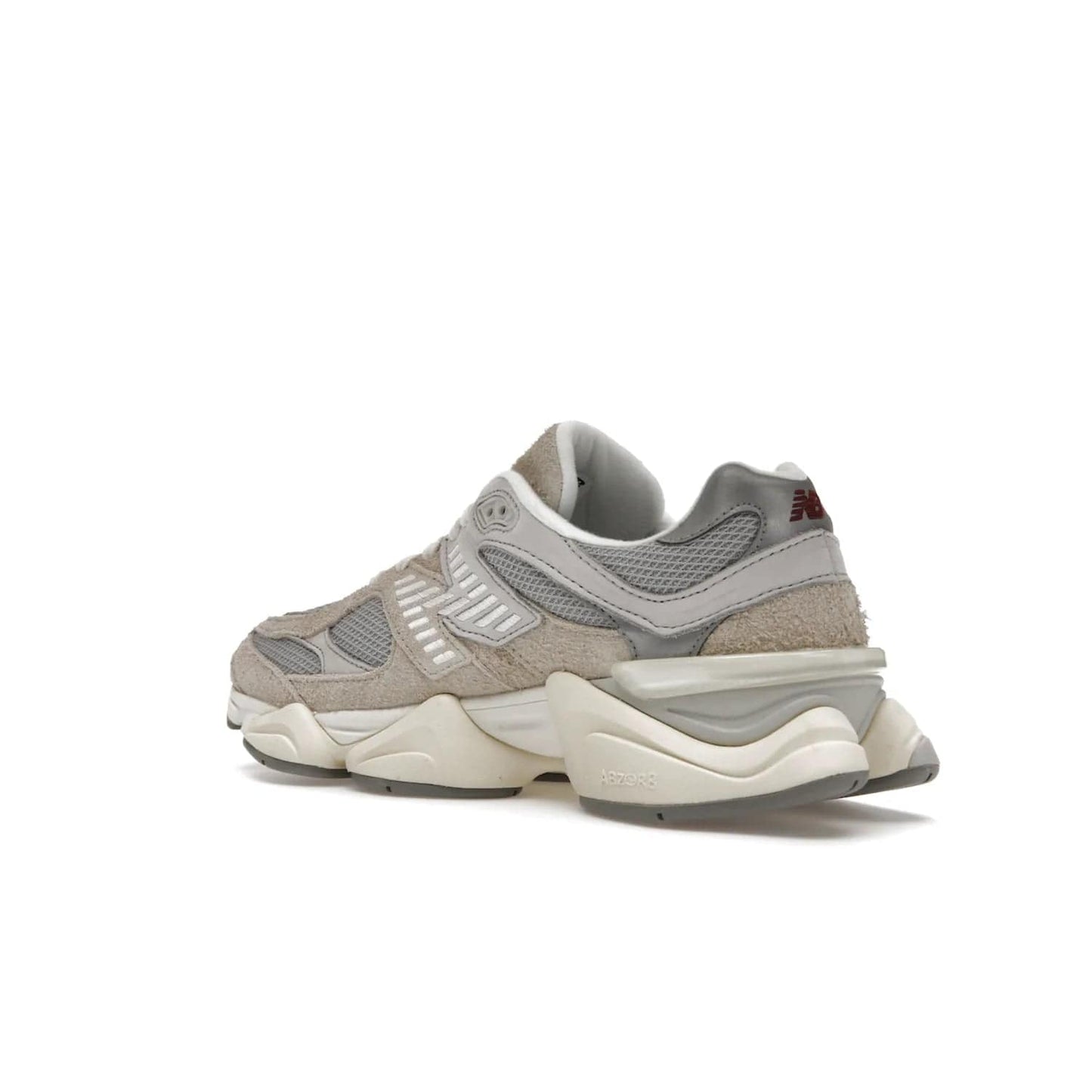 New Balance 9060 Lunar New Year Timberwolf Grey - Image 23 - Only at www.BallersClubKickz.com - This New Balance 9060 Lunar New Year Timberwolf Grey features a mesh upper and furry suede overlays in a stylish Timberwolf/Rain Cloud/Silver Metallic colorway. Its contemporary design includes ABZORB and SBS cushioning, a chunky rubber sole, and a lace-up front. Crafted to offer nothing but the best in style and comfort, the shoe released on 2nd January 2023.