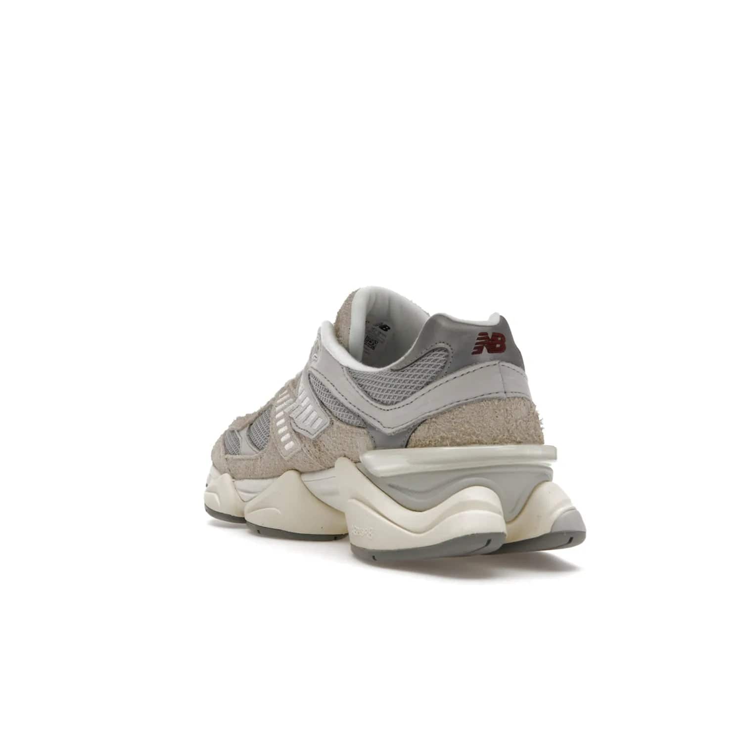 New Balance 9060 Lunar New Year Timberwolf Grey - Image 25 - Only at www.BallersClubKickz.com - This New Balance 9060 Lunar New Year Timberwolf Grey features a mesh upper and furry suede overlays in a stylish Timberwolf/Rain Cloud/Silver Metallic colorway. Its contemporary design includes ABZORB and SBS cushioning, a chunky rubber sole, and a lace-up front. Crafted to offer nothing but the best in style and comfort, the shoe released on 2nd January 2023.