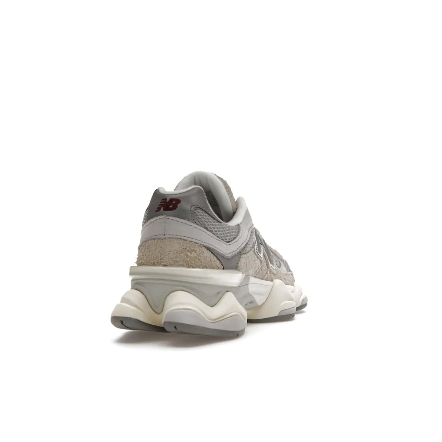 New Balance 9060 Lunar New Year Timberwolf Grey - Image 30 - Only at www.BallersClubKickz.com - This New Balance 9060 Lunar New Year Timberwolf Grey features a mesh upper and furry suede overlays in a stylish Timberwolf/Rain Cloud/Silver Metallic colorway. Its contemporary design includes ABZORB and SBS cushioning, a chunky rubber sole, and a lace-up front. Crafted to offer nothing but the best in style and comfort, the shoe released on 2nd January 2023.
