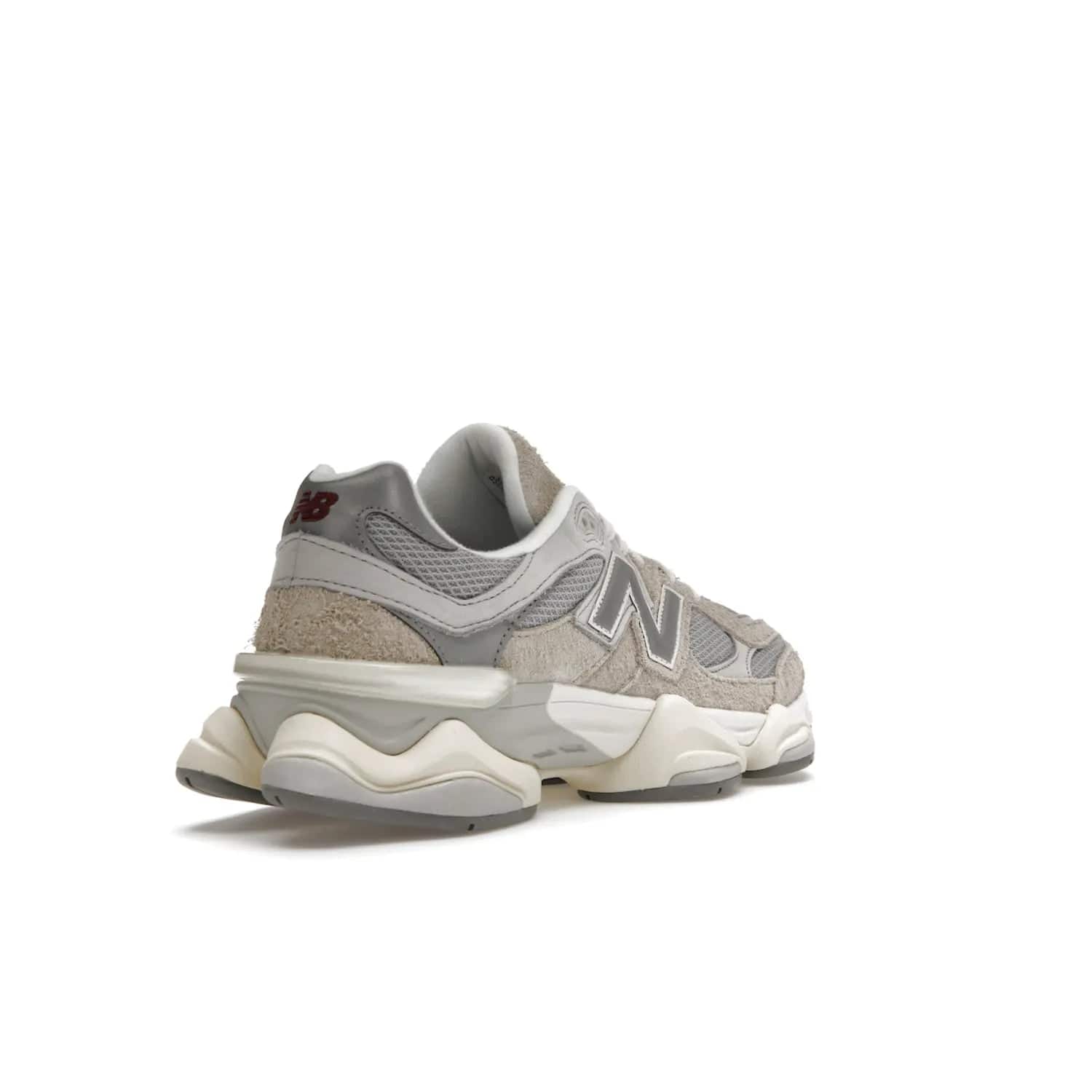 New Balance 9060 Lunar New Year Timberwolf Grey - Image 32 - Only at www.BallersClubKickz.com - This New Balance 9060 Lunar New Year Timberwolf Grey features a mesh upper and furry suede overlays in a stylish Timberwolf/Rain Cloud/Silver Metallic colorway. Its contemporary design includes ABZORB and SBS cushioning, a chunky rubber sole, and a lace-up front. Crafted to offer nothing but the best in style and comfort, the shoe released on 2nd January 2023.