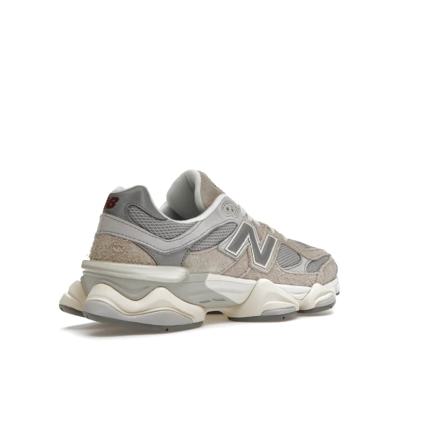 New Balance 9060 Lunar New Year Timberwolf Grey - Image 33 - Only at www.BallersClubKickz.com - This New Balance 9060 Lunar New Year Timberwolf Grey features a mesh upper and furry suede overlays in a stylish Timberwolf/Rain Cloud/Silver Metallic colorway. Its contemporary design includes ABZORB and SBS cushioning, a chunky rubber sole, and a lace-up front. Crafted to offer nothing but the best in style and comfort, the shoe released on 2nd January 2023.