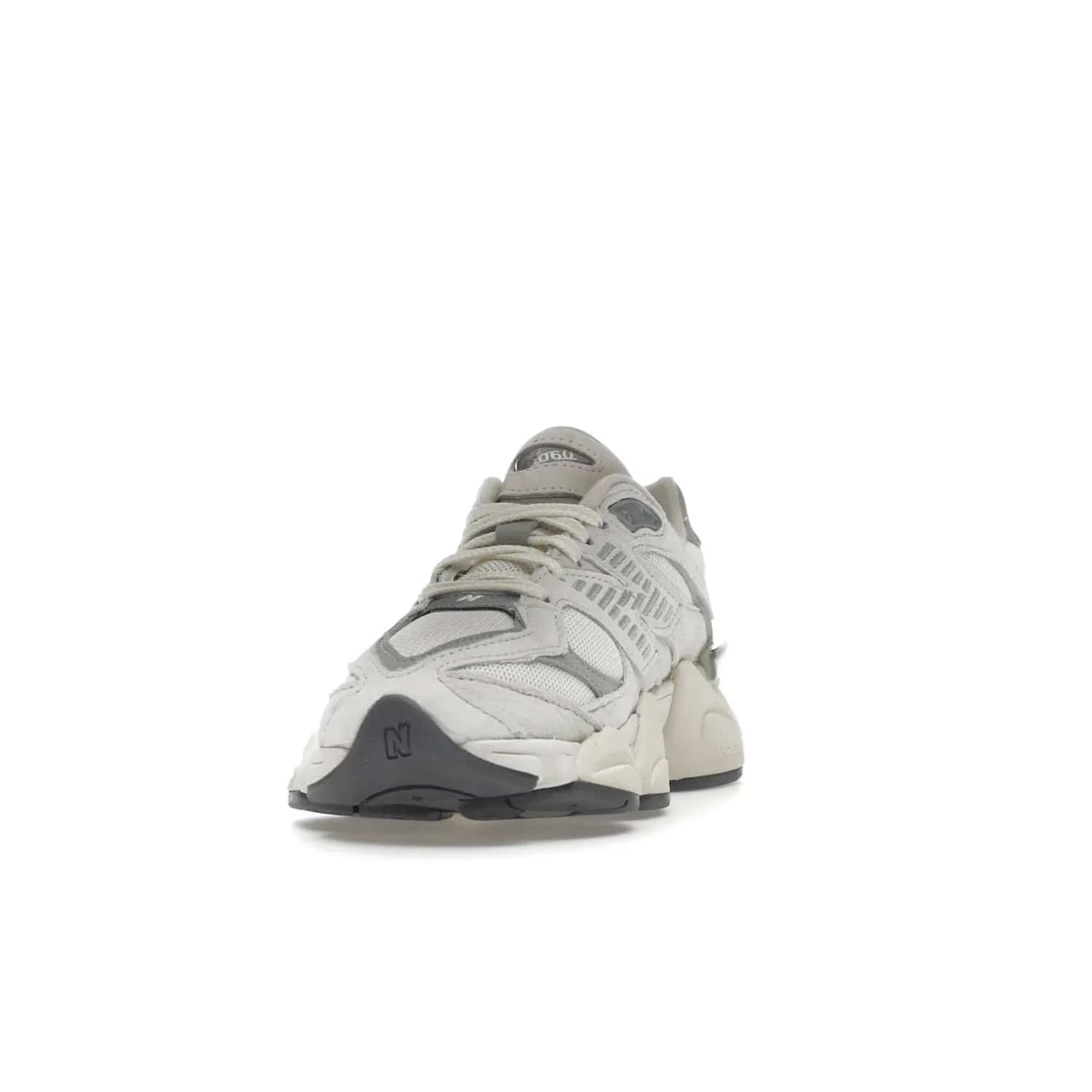 New Balance 9060 Sea Salt White - Image 12 - Only at www.BallersClubKickz.com - Stylish and classic New Balance 9060 Sea Salt White sneaker with premium leather and mesh for all-day comfort. Minimalist look, perfect for any occasion, and Jan 14, 2023 release date. Sleek design, exceptional materials, and timeless style.