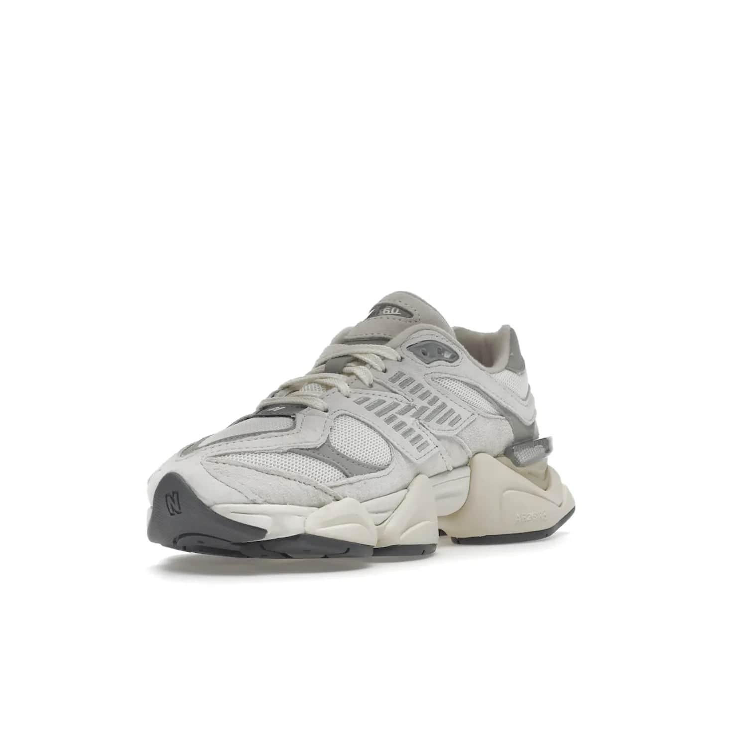New Balance 9060 Sea Salt White - Image 14 - Only at www.BallersClubKickz.com - Stylish and classic New Balance 9060 Sea Salt White sneaker with premium leather and mesh for all-day comfort. Minimalist look, perfect for any occasion, and Jan 14, 2023 release date. Sleek design, exceptional materials, and timeless style.