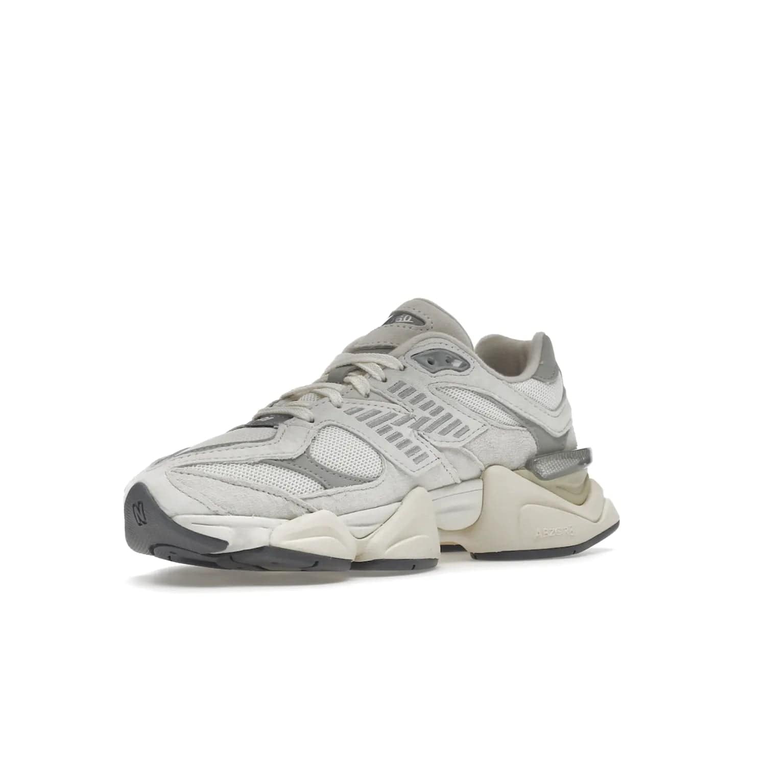 New Balance 9060 Sea Salt White - Image 15 - Only at www.BallersClubKickz.com - Stylish and classic New Balance 9060 Sea Salt White sneaker with premium leather and mesh for all-day comfort. Minimalist look, perfect for any occasion, and Jan 14, 2023 release date. Sleek design, exceptional materials, and timeless style.
