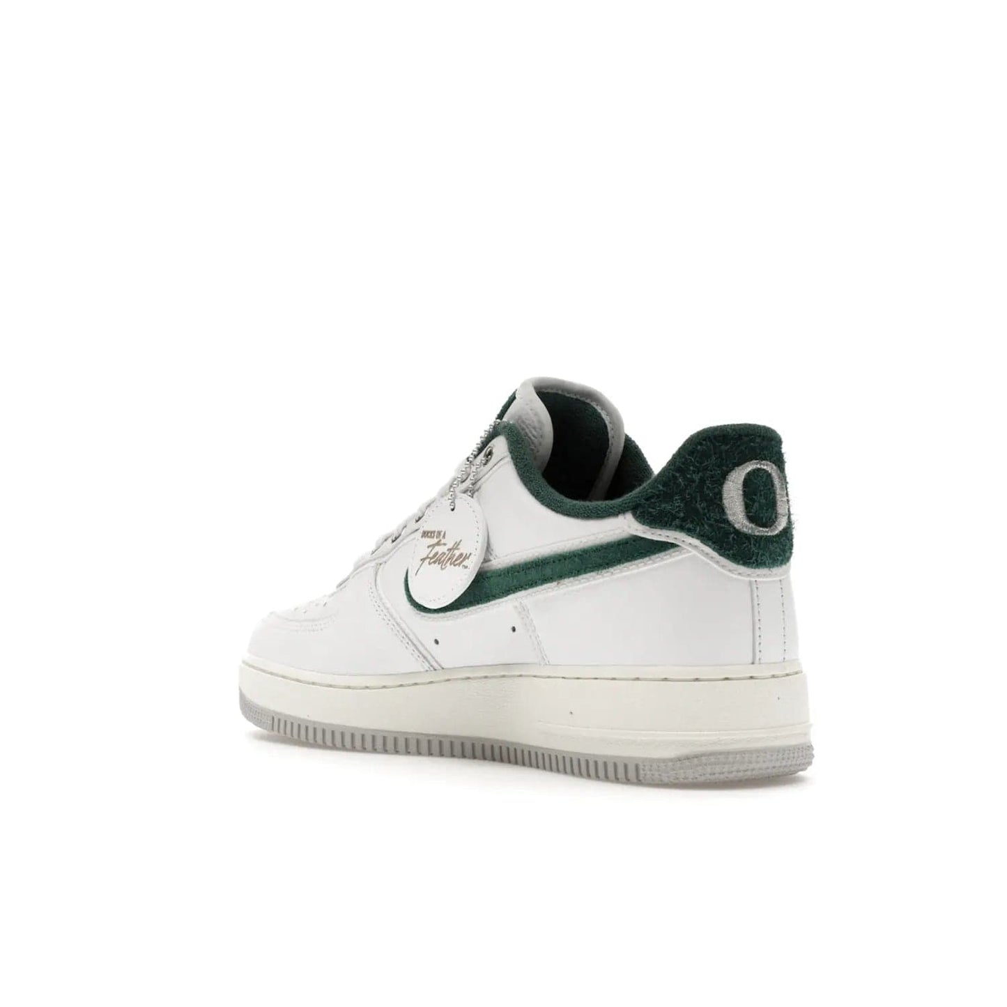Nike Air Force 1 Low '07 Premium University of Oregon PE - Image 24 - Only at www.BallersClubKickz.com - The Nike Air Force 1 Low '07 Premium. Special Oregon University colorway. White base with green and sail accents. Cushioned rubber midsole. Comfort and style. Support your school!