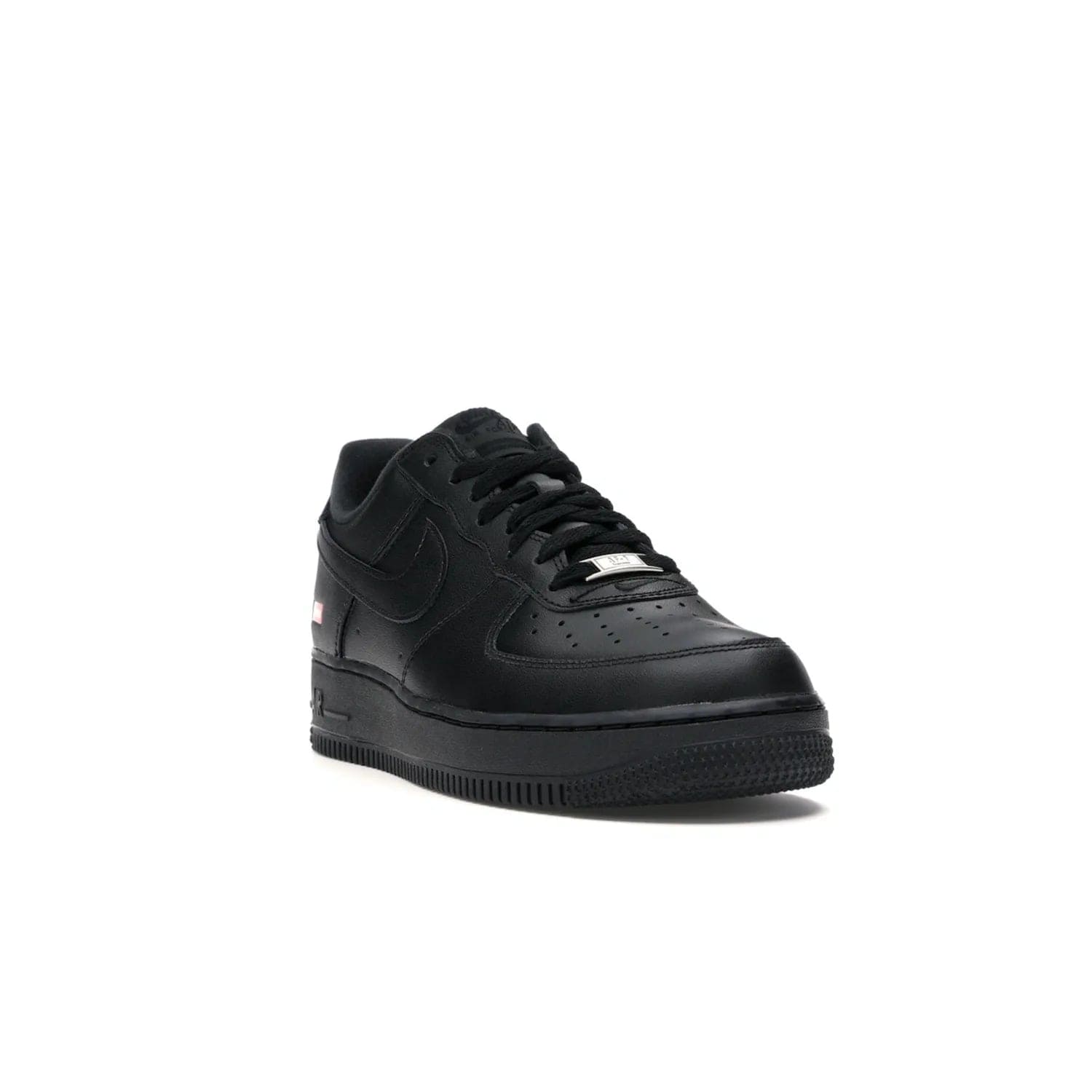 Nike Air Force 1 Low Supreme Black - Image 7 - Only at www.BallersClubKickz.com - Iconic style meets classic black design in the Nike Air Force 1 Low Supreme Black. Featuring a luxe leather upper and red Supreme Box Logo at the heel, these sneakers released in March 2020, and now available.