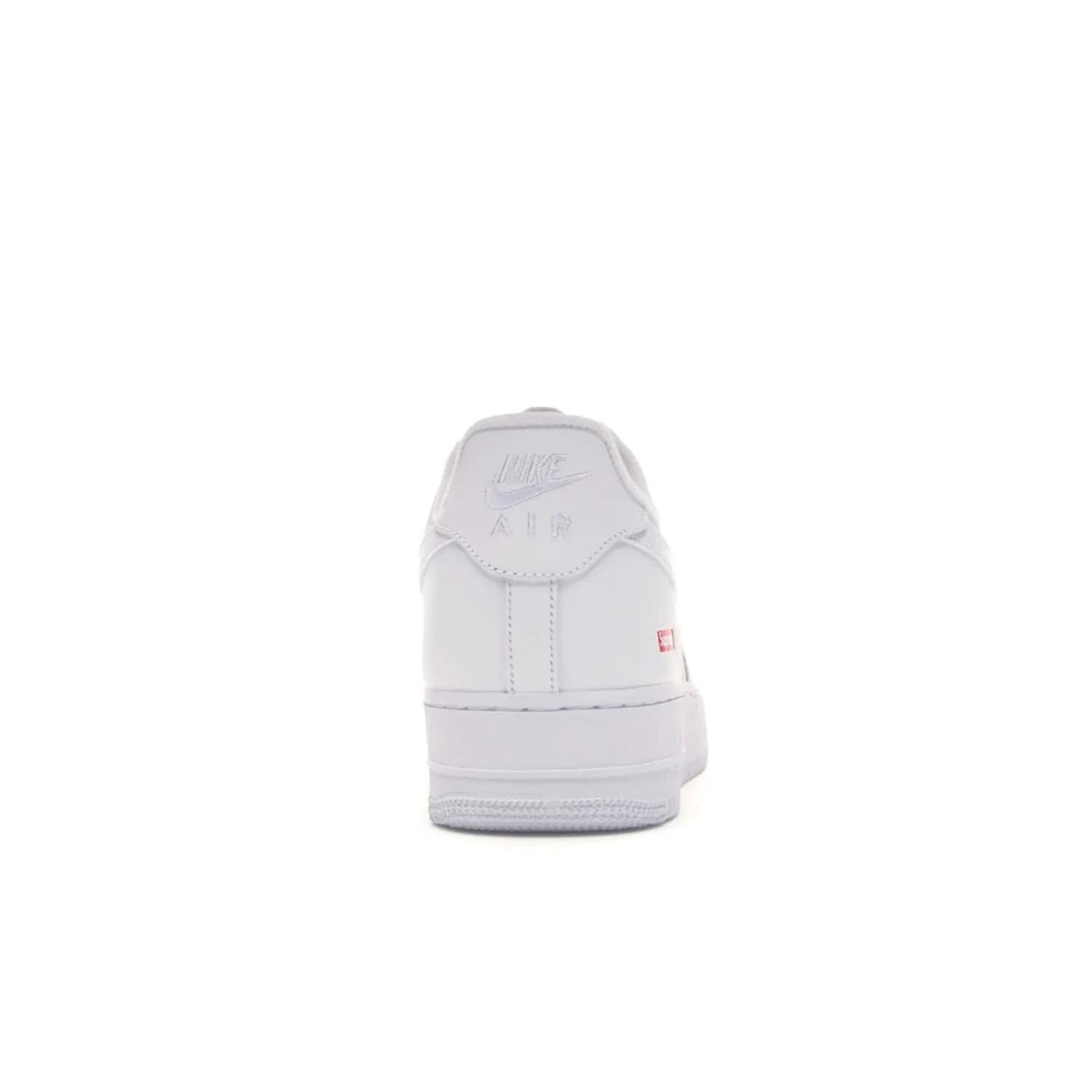 Nike Air Force 1 Low Supreme White - Image 28 - Only at www.BallersClubKickz.com - The Nike Air Force 1 Low Supreme White - a classic all-white design featuring premium leather and the iconic red Supreme Box Logo. Iconic sneakers embodying NYC style and culture. Released March 2020.