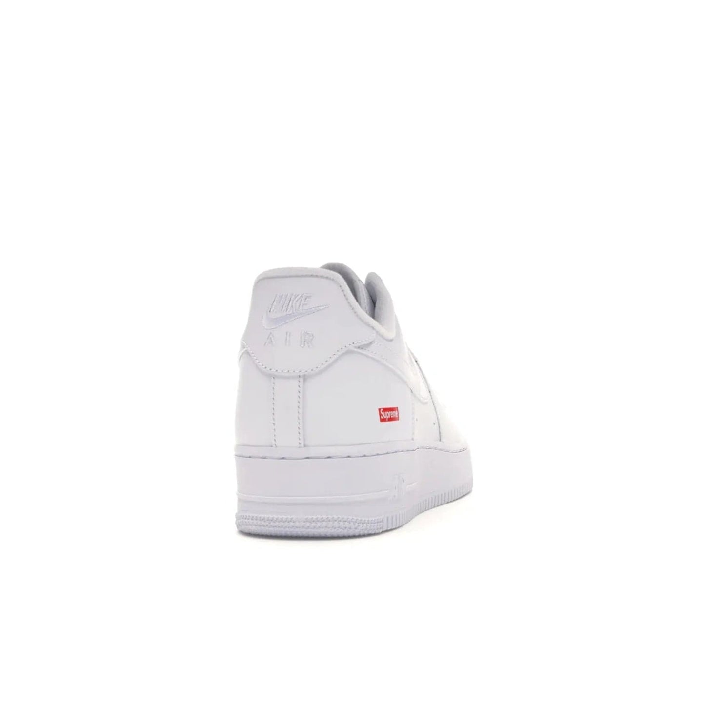 Nike Air Force 1 Low Supreme White - Image 29 - Only at www.BallersClubKickz.com - The Nike Air Force 1 Low Supreme White - a classic all-white design featuring premium leather and the iconic red Supreme Box Logo. Iconic sneakers embodying NYC style and culture. Released March 2020.