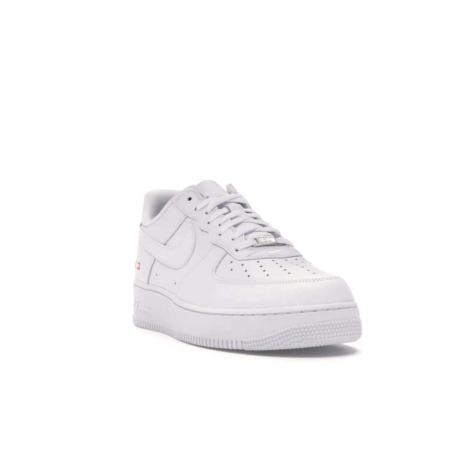 Nike Air Force 1 Low Supreme White - Image 7 - Only at www.BallersClubKickz.com - The Nike Air Force 1 Low Supreme White - a classic all-white design featuring premium leather and the iconic red Supreme Box Logo. Iconic sneakers embodying NYC style and culture. Released March 2020.