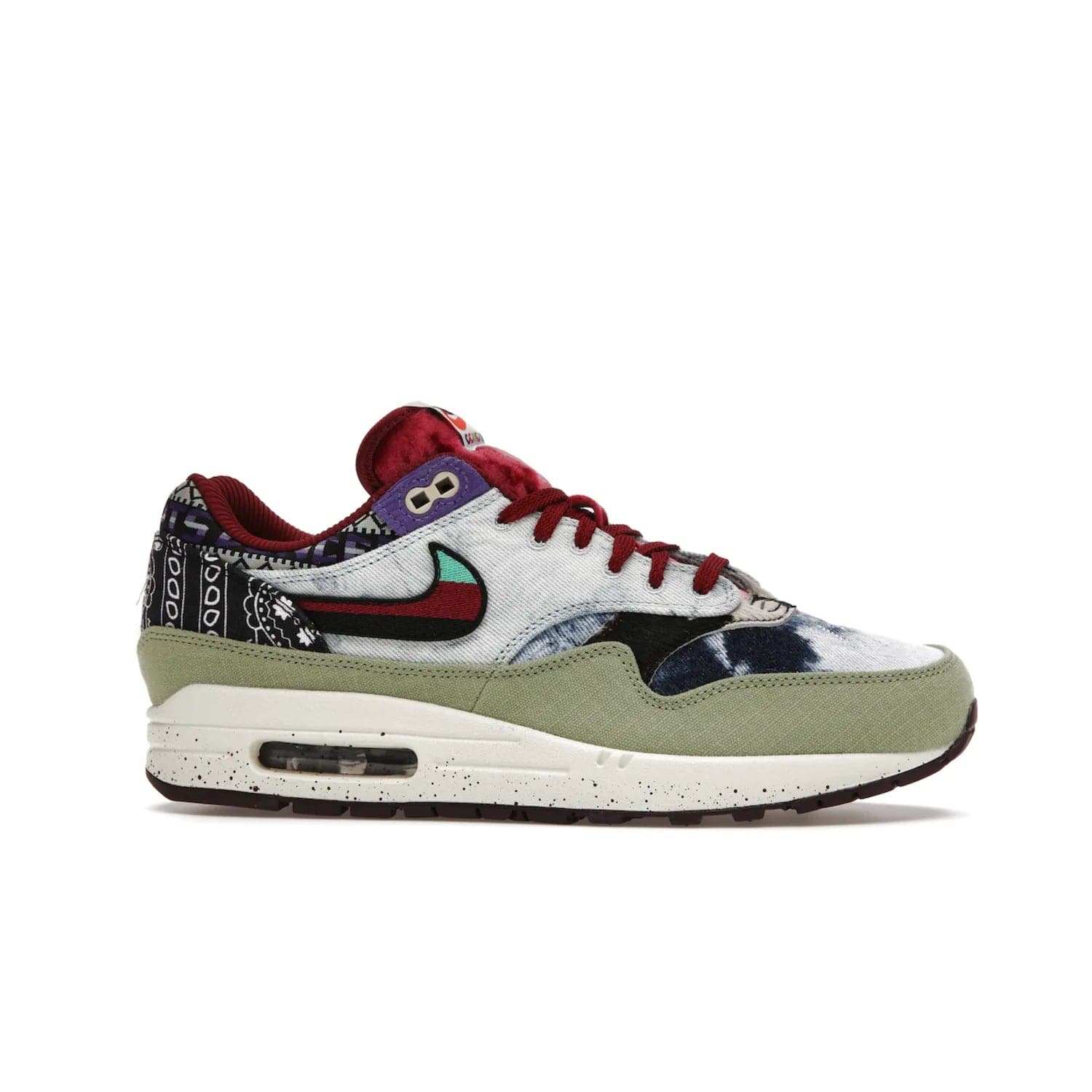 Nike Air Max 1 SP Concepts Mellow - Image 2 - Only at www.BallersClubKickz.com - The Nike Air Max 1 SP Concepts Mellow combines classic and modern style with unique materials, embroidery, and a speckled sole. Get heads turning with this stylish sneaker, releasing March 2022.