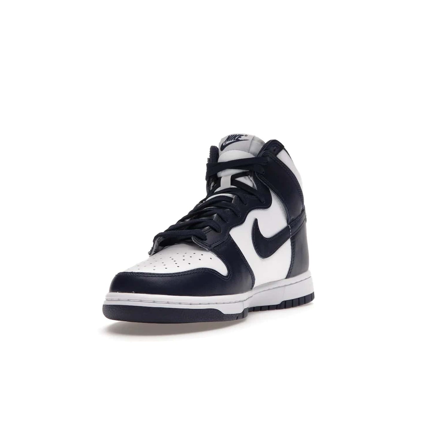 Nike Dunk High Championship Navy - Image 13 - Only at www.BallersClubKickz.com - Classic Nike Dunk High sneaker delivers an unforgettable style with white leather upper, Championship Navy overlays, and matching woven tongue label and sole. Make a statement with the Championship Navy today.