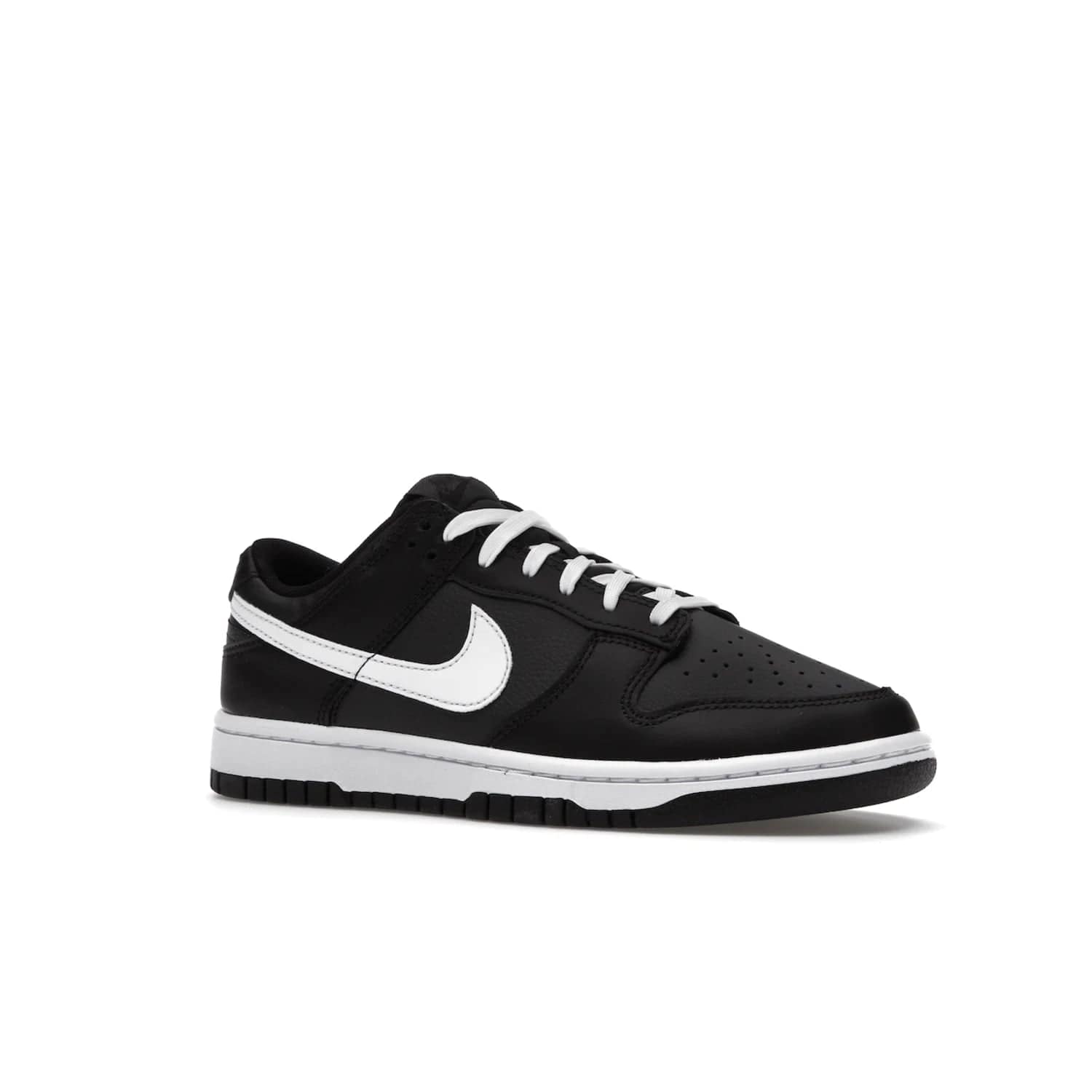 Nike Dunk Low Black White (2022) - Image 4 - Only at www.BallersClubKickz.com - A classic Nike Dunk Low in black and white. Its tumbled leather upper features leather overlays and white Nike Swooshes. The design also includes a woven tongue label and an EVA foam sole for cushioning and support. An effortlessly stylish and timeless look. The Nike Dunk Low Black White (2022) released in May. Step out in style.