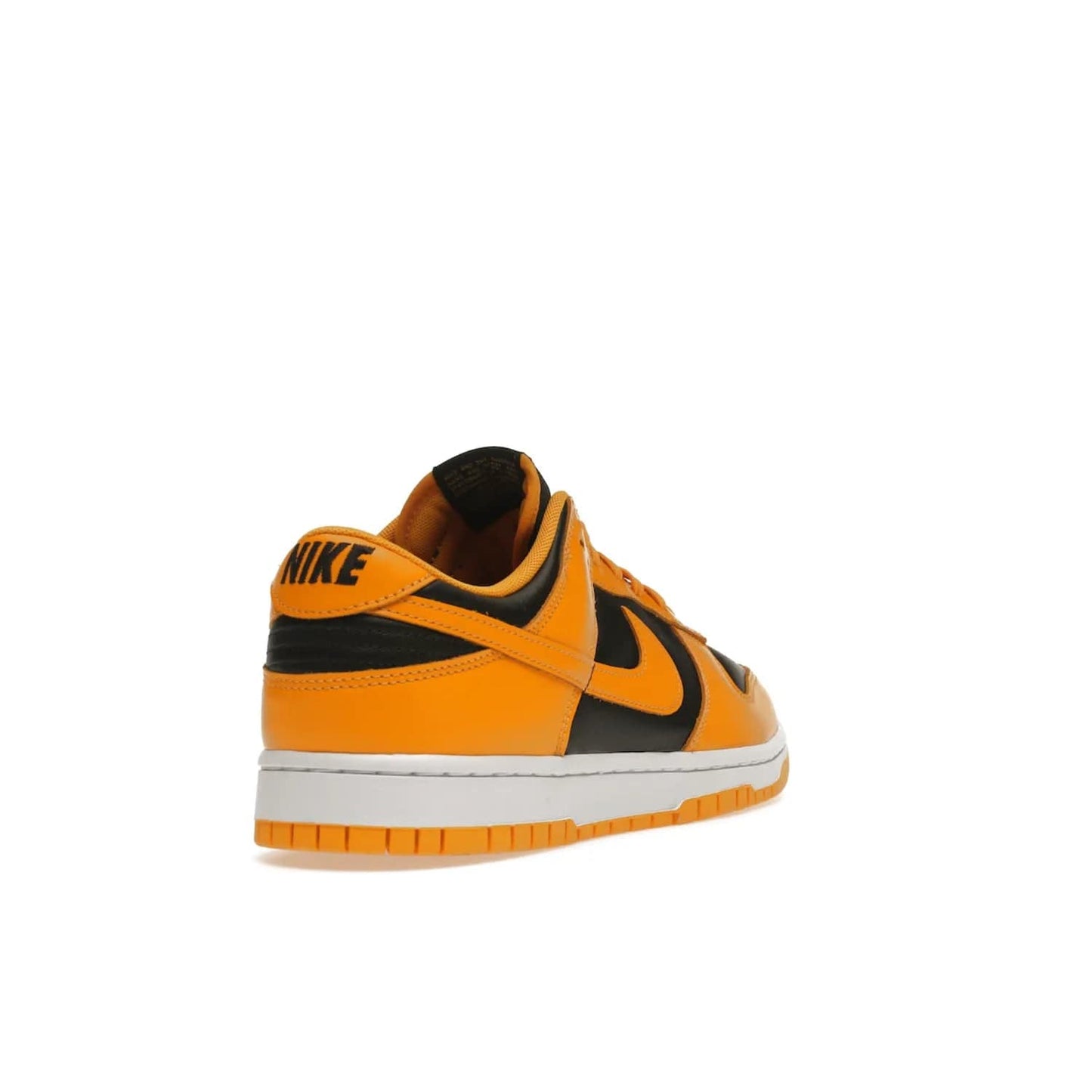 Nike Dunk Low Championship Goldenrod (2021) - Image 31 - Only at www.BallersClubKickz.com - Iconic silhouette Nike Dunk Low is back with a luxe look. Featuring a black upper, goldenrod overlays, and white and yellow Nike Air sole, this retro inspired design is perfect for the sneaker culture enthusiast. Releasing in December 2021 at $100.